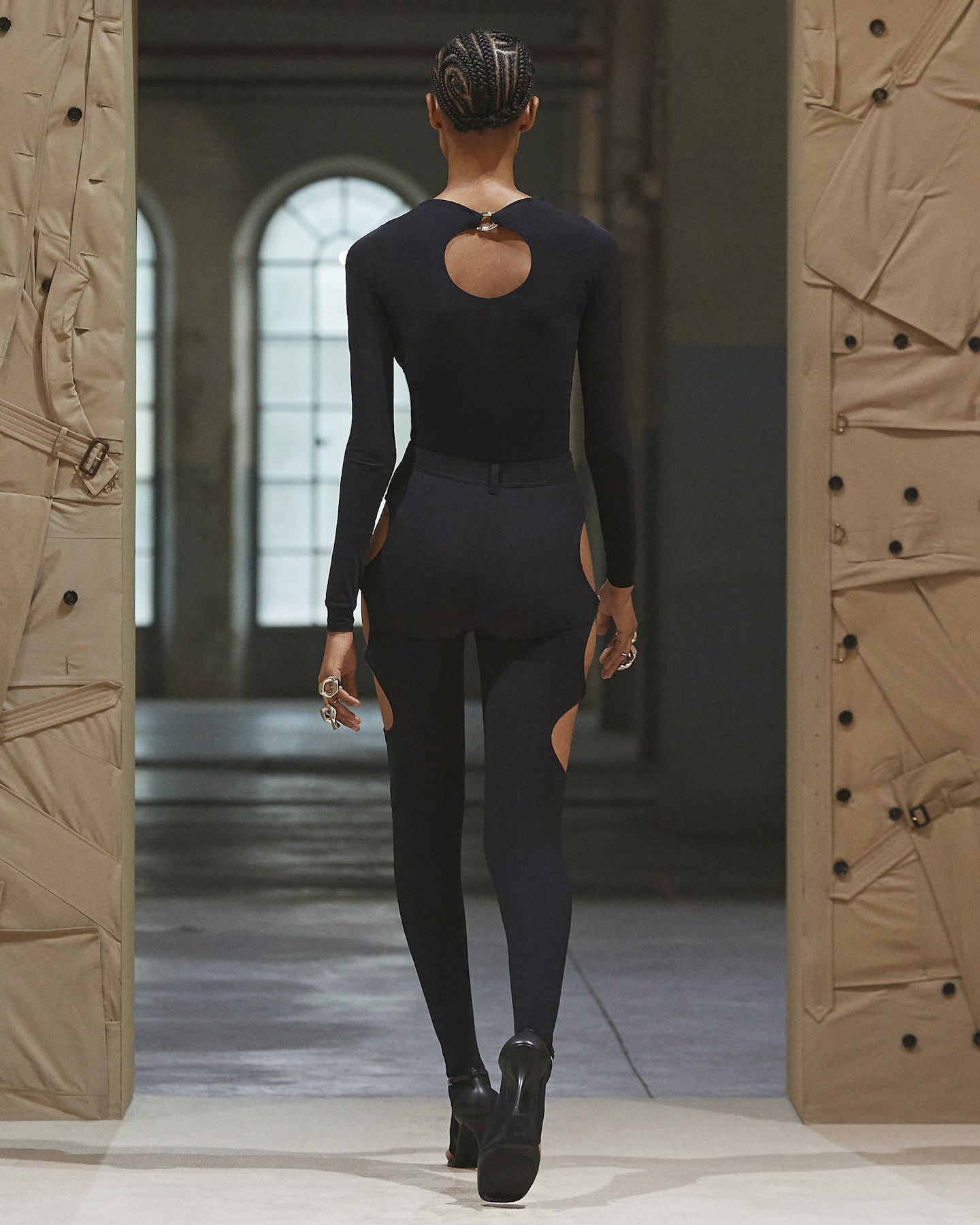 A model wearing a black two-piece from Burberry