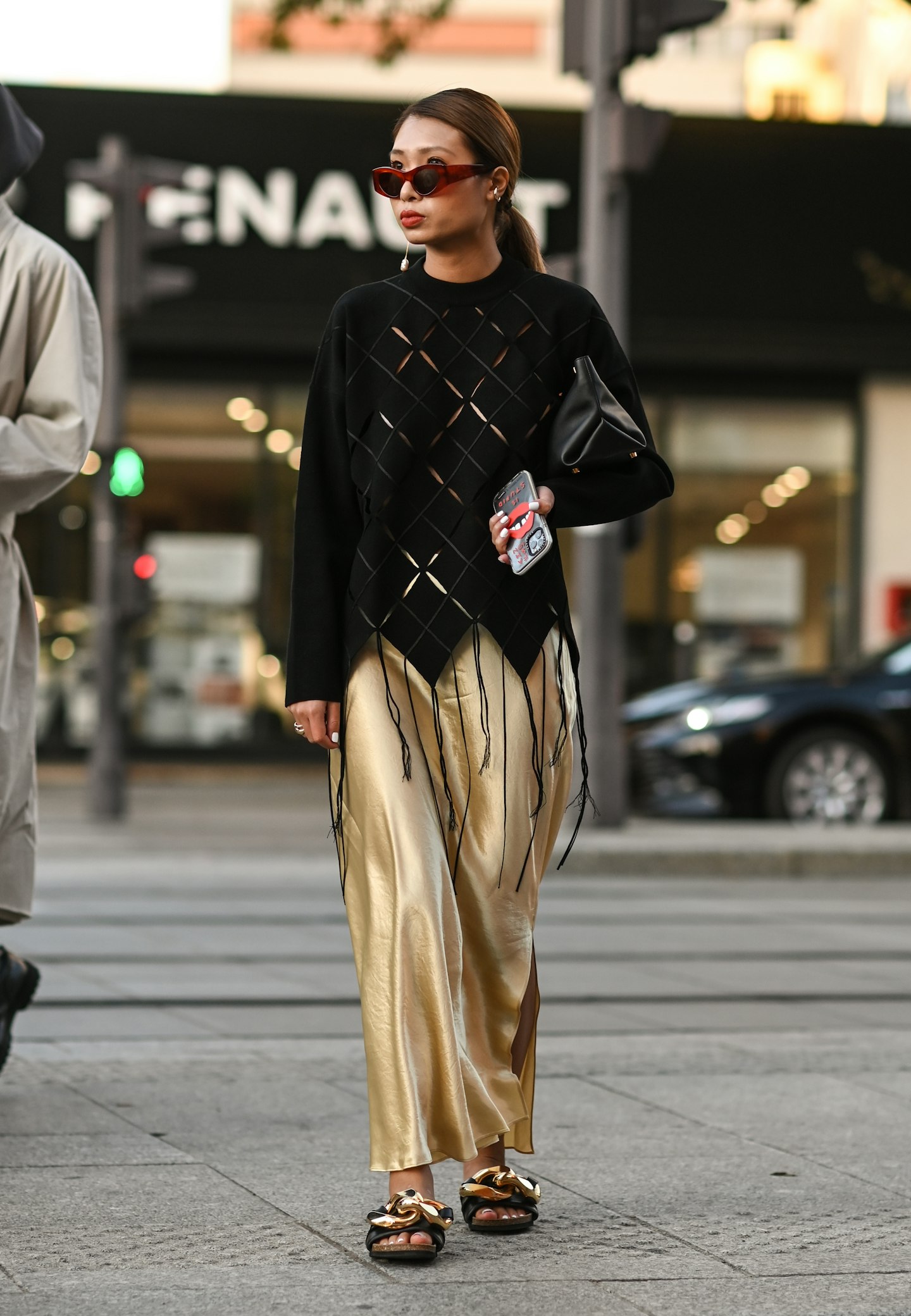 slinky gold trousers were a hit outside Acne Studios