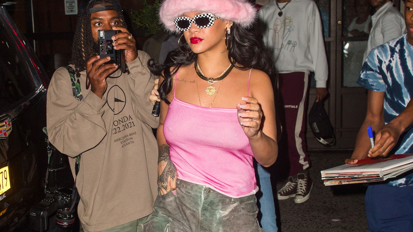 Rihanna wearing camo-print pants 