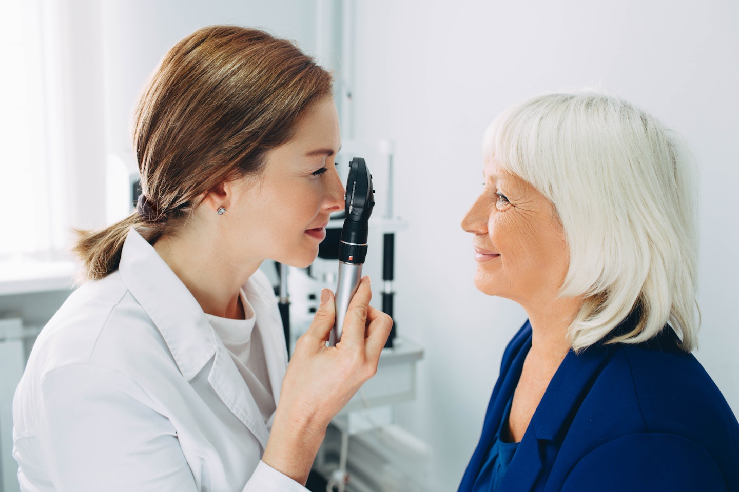 over 60 woman getting eye test