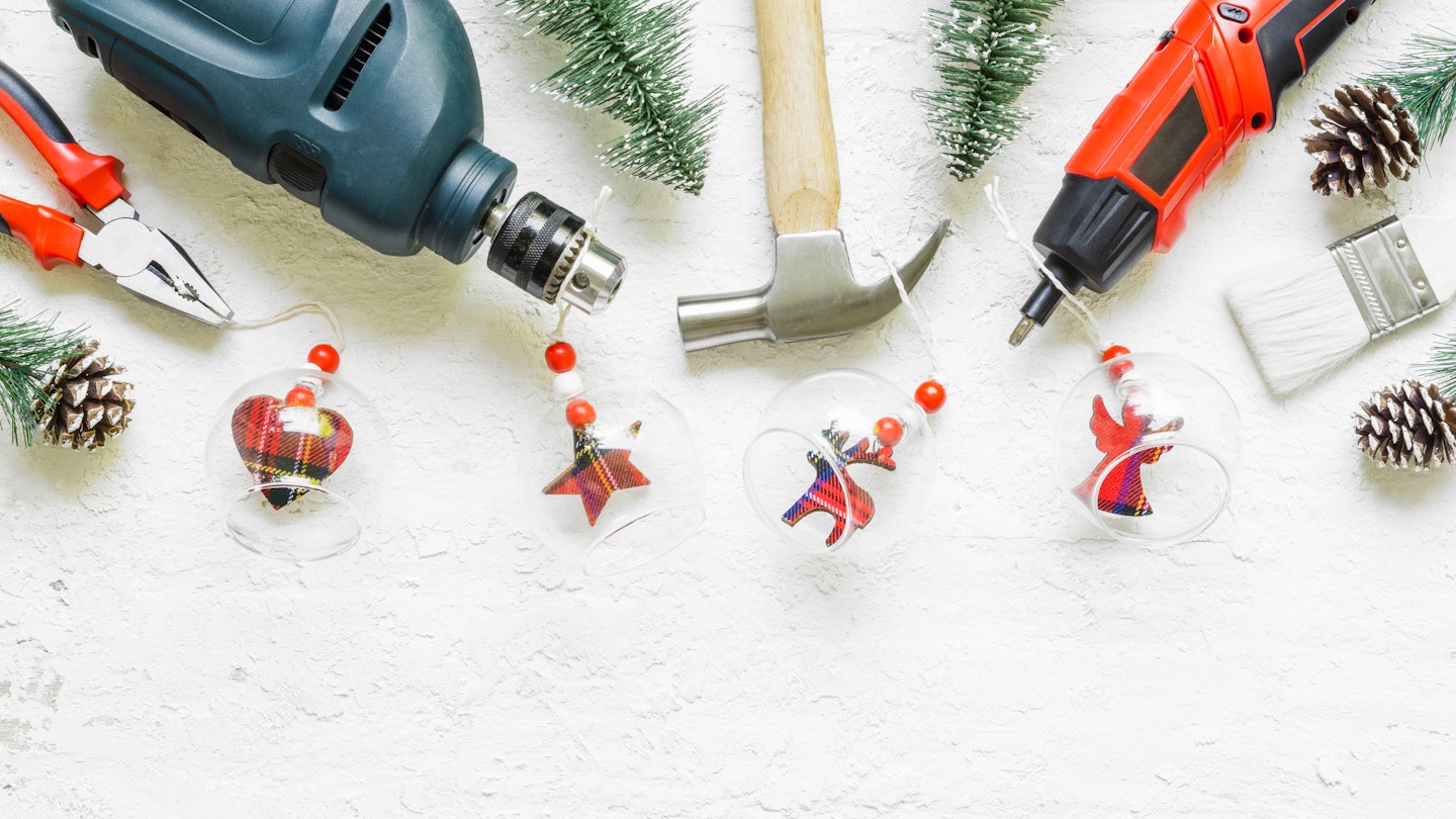 Power tools with baubles hanging off them