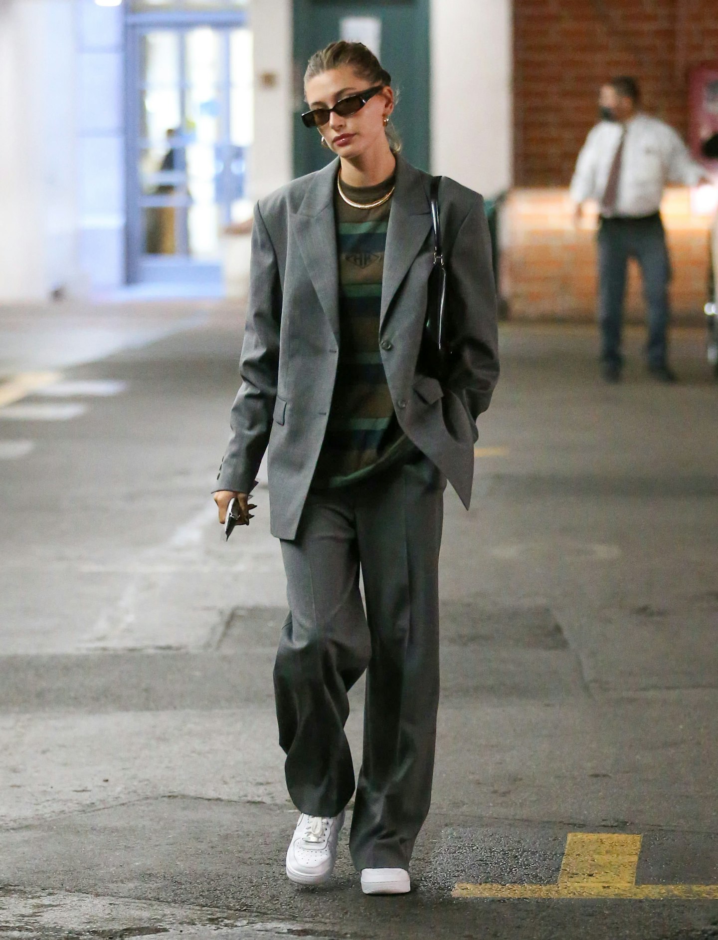 Hailey Bieber wearing a slouchy suit