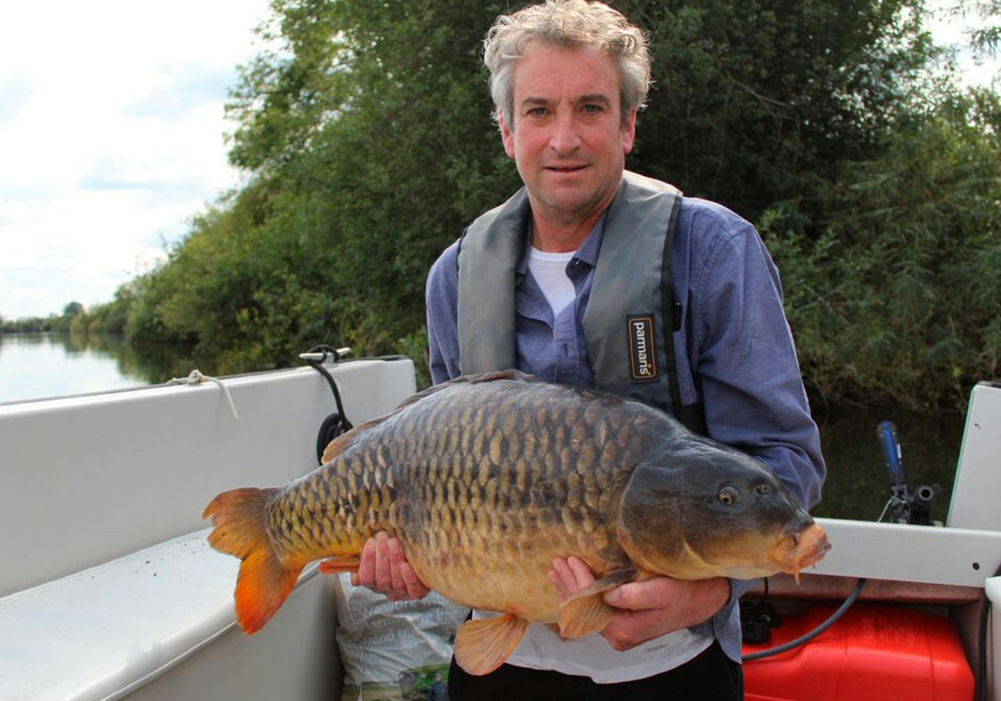 Bob with the 37lb 7oz carp taken from a boat on the River Severn