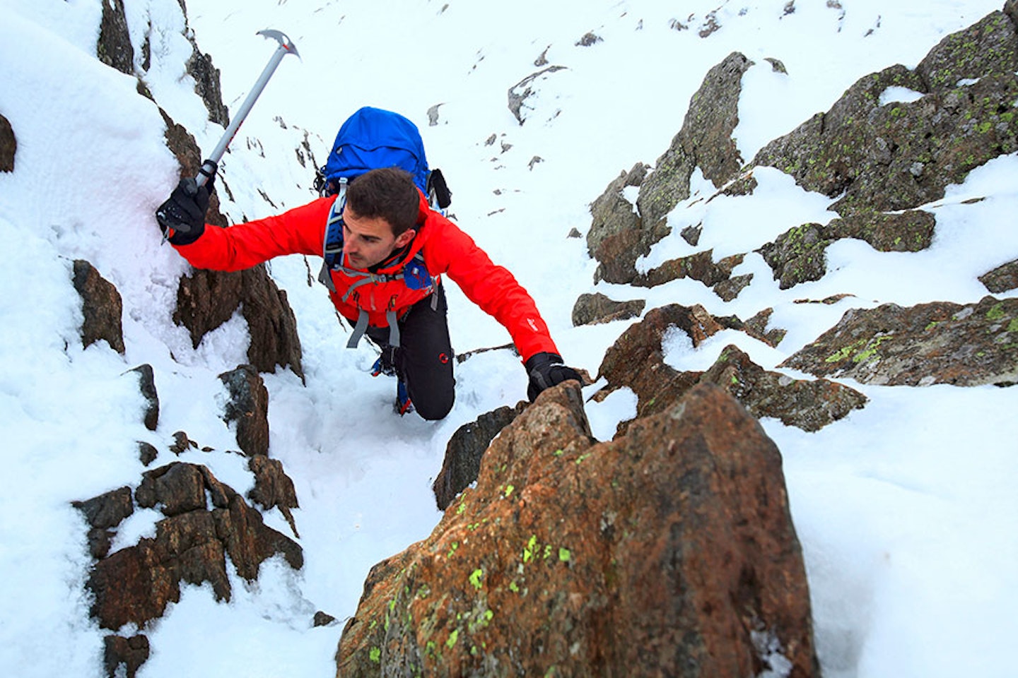 Using an ice axe to ascend a section of Striding Edge.