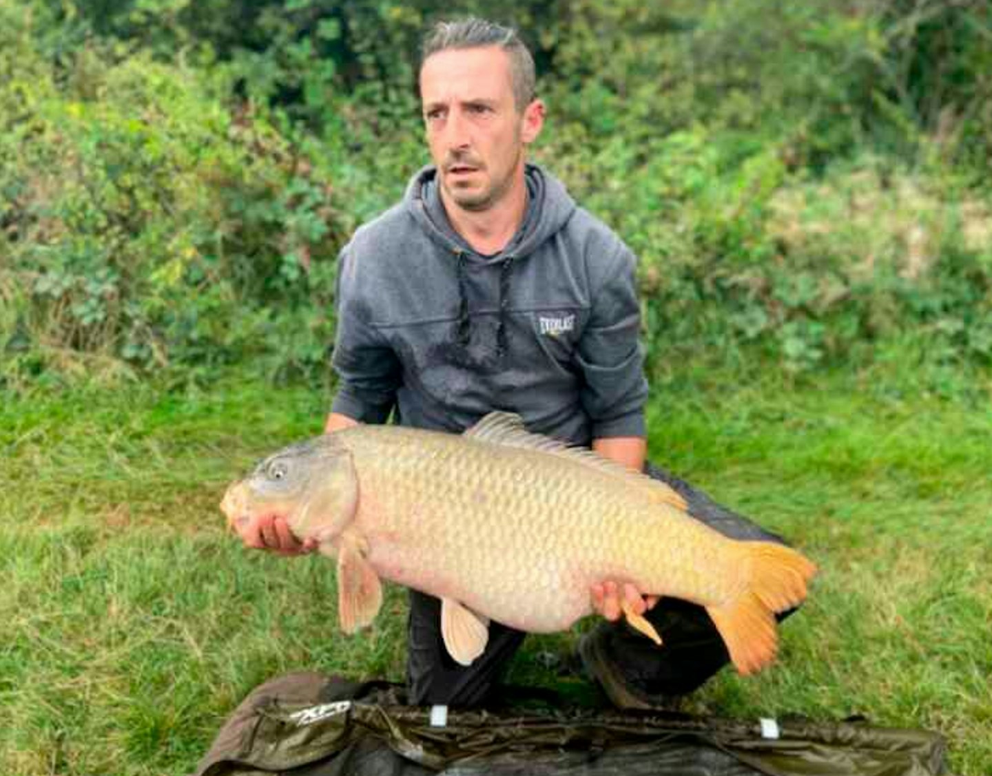 Wayne Means and his 40lb carp on the pole