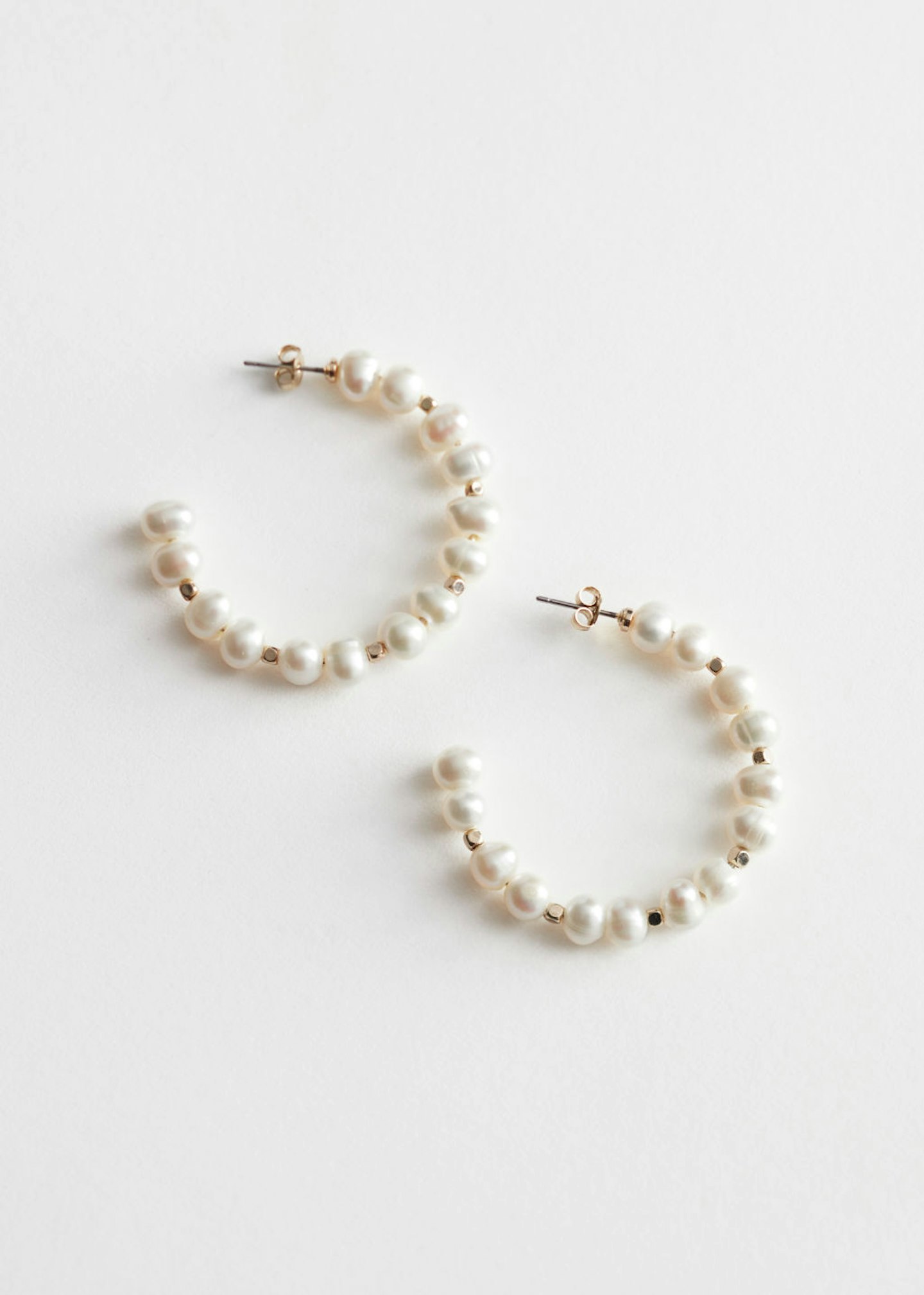 Pearl-Drop-Hoop-Earrings---A-New-Dayu2122-Gold-Organic-Pearl-Open-Hoop-Earrings-love-quinn-season-3-alice-in-wonderland-dress-library-gala