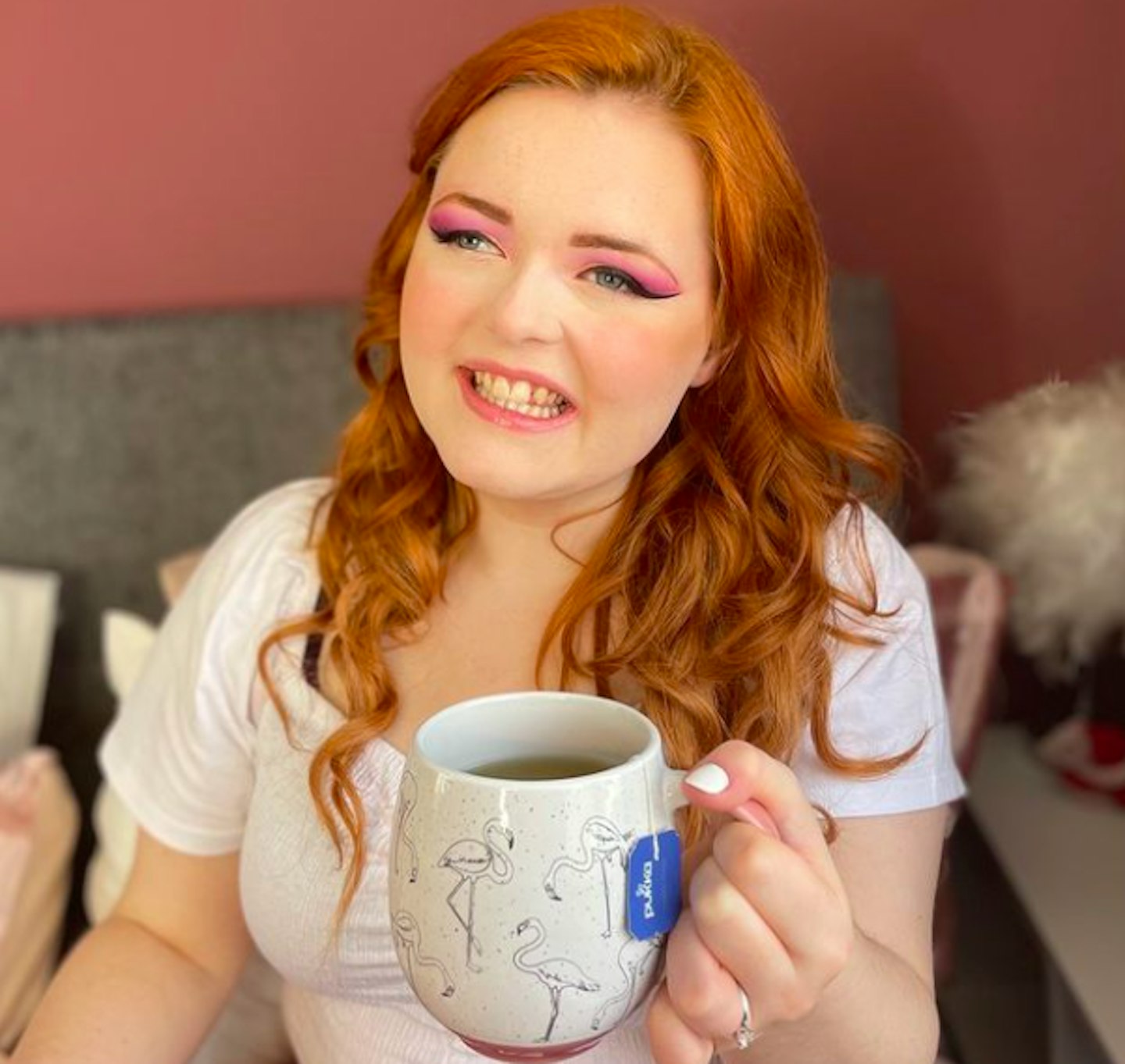 Lucy Edwards holding a cup of tea