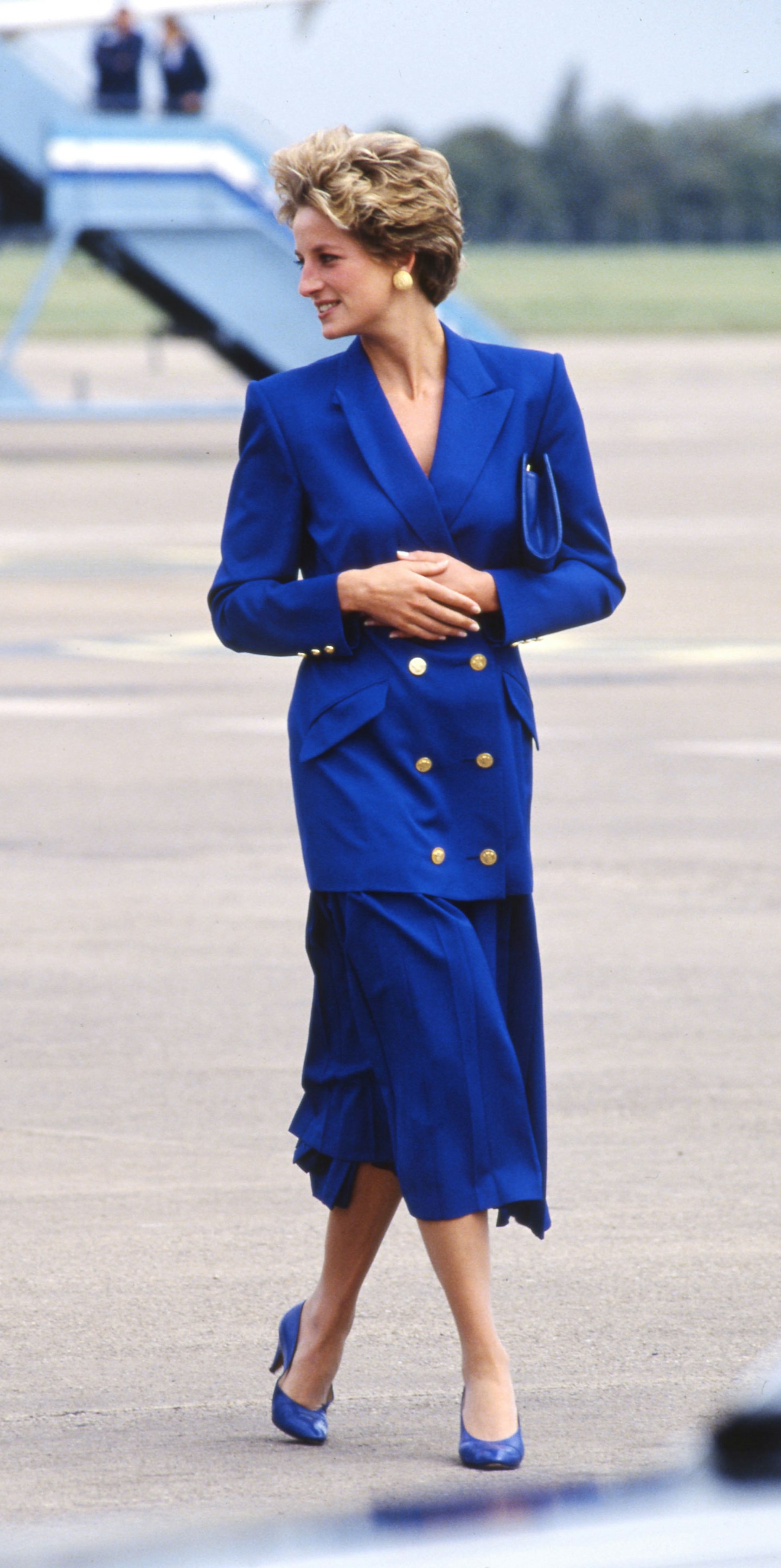 Princess Diana wearing a royal blue skirt suit