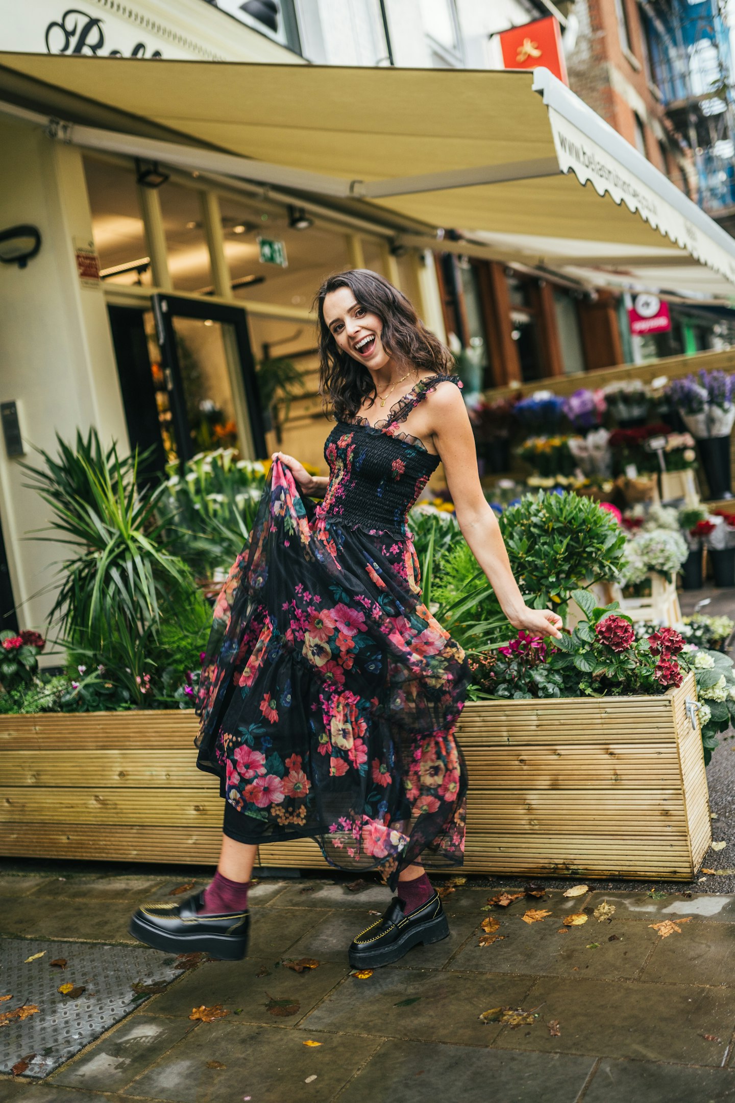 venetia la manna in a floral dress