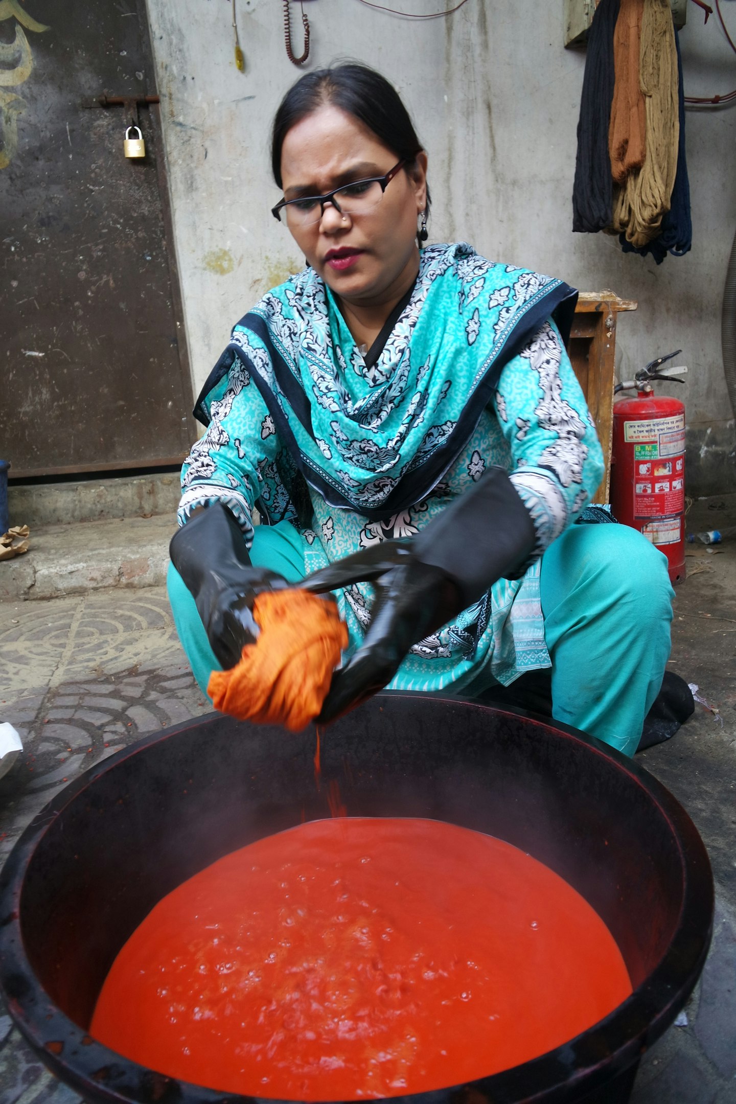 A woman dyeing fabric 
