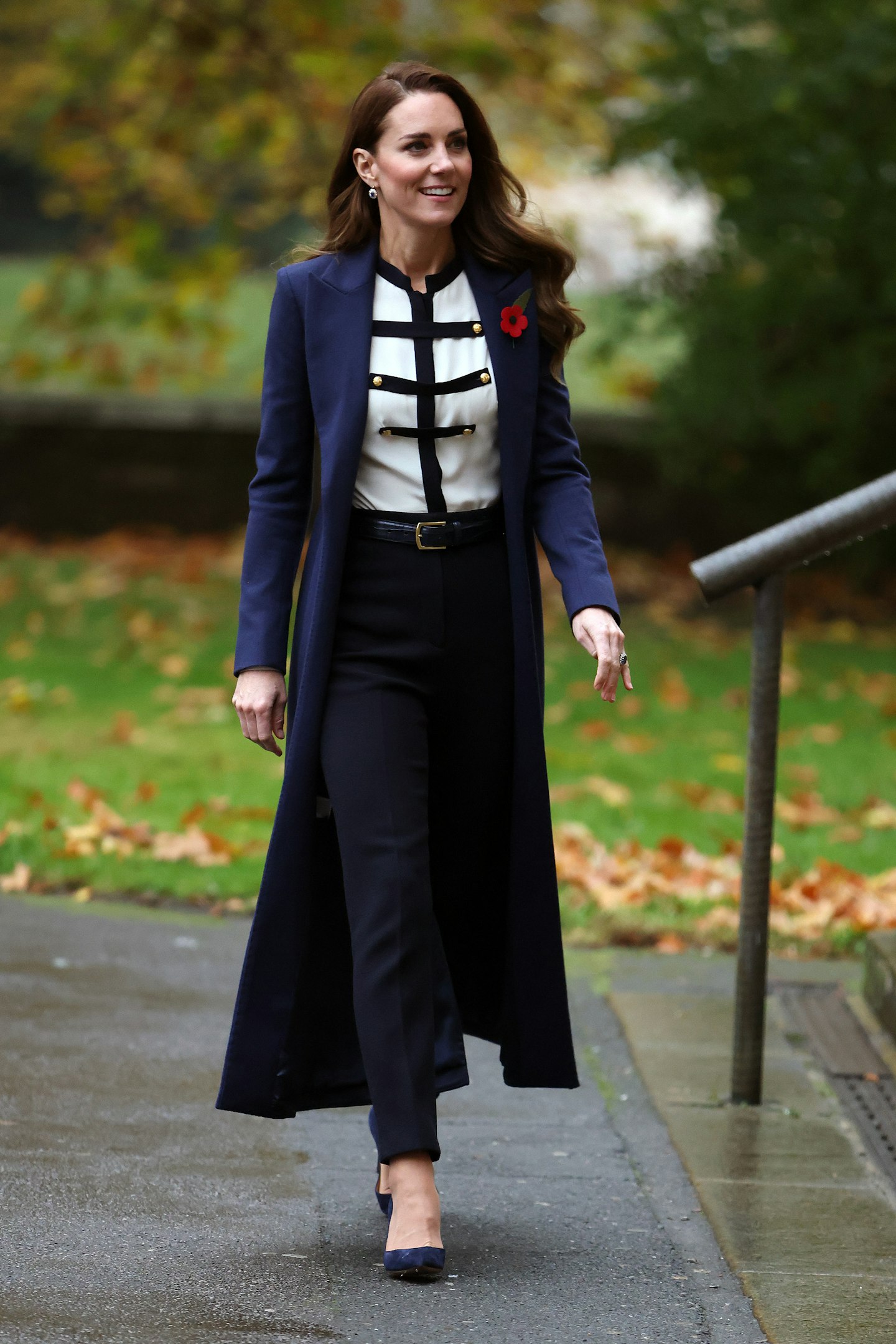 Kate Middleton wearing a navy coat from Catherine Walker