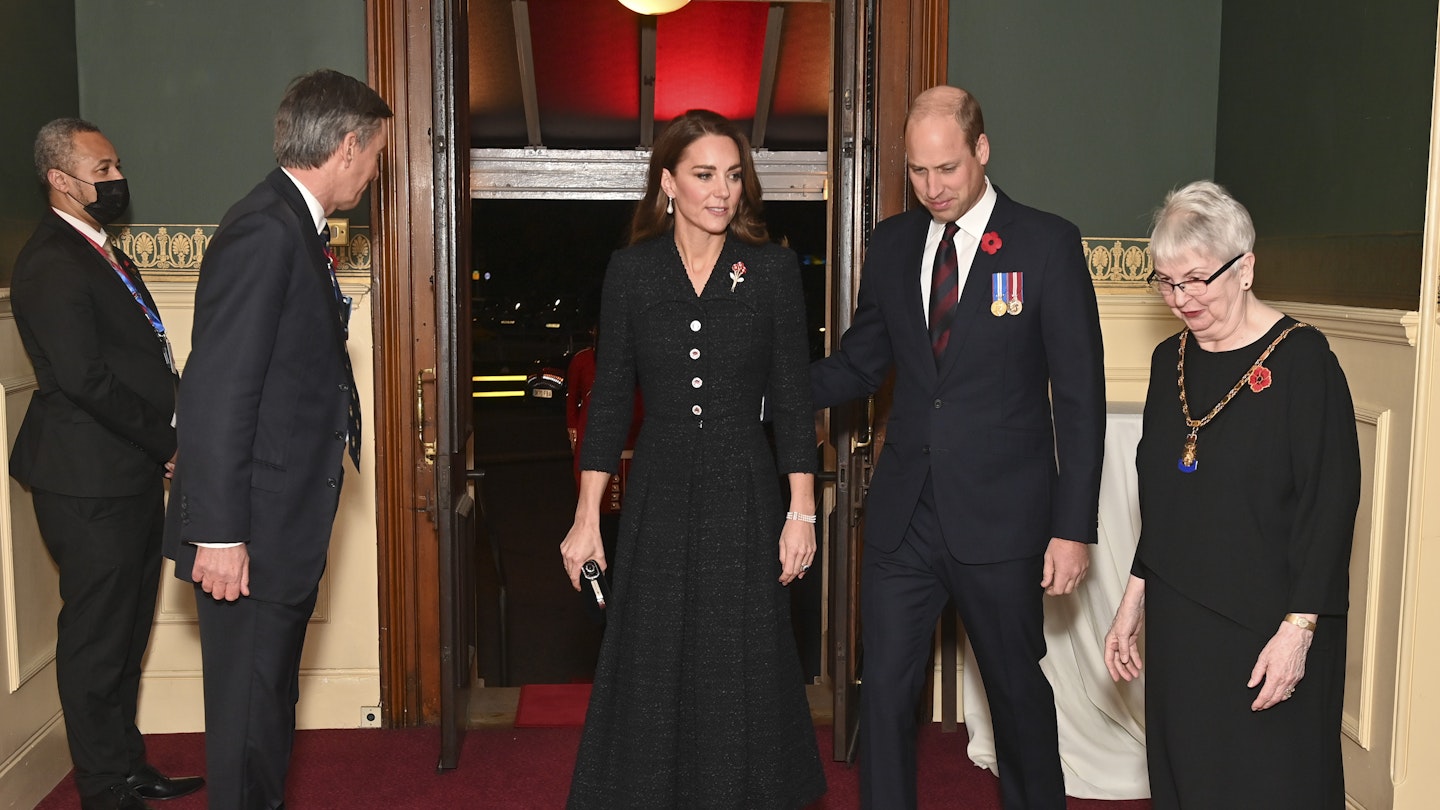 Kate Middleton wearing a black dress from Eponine
