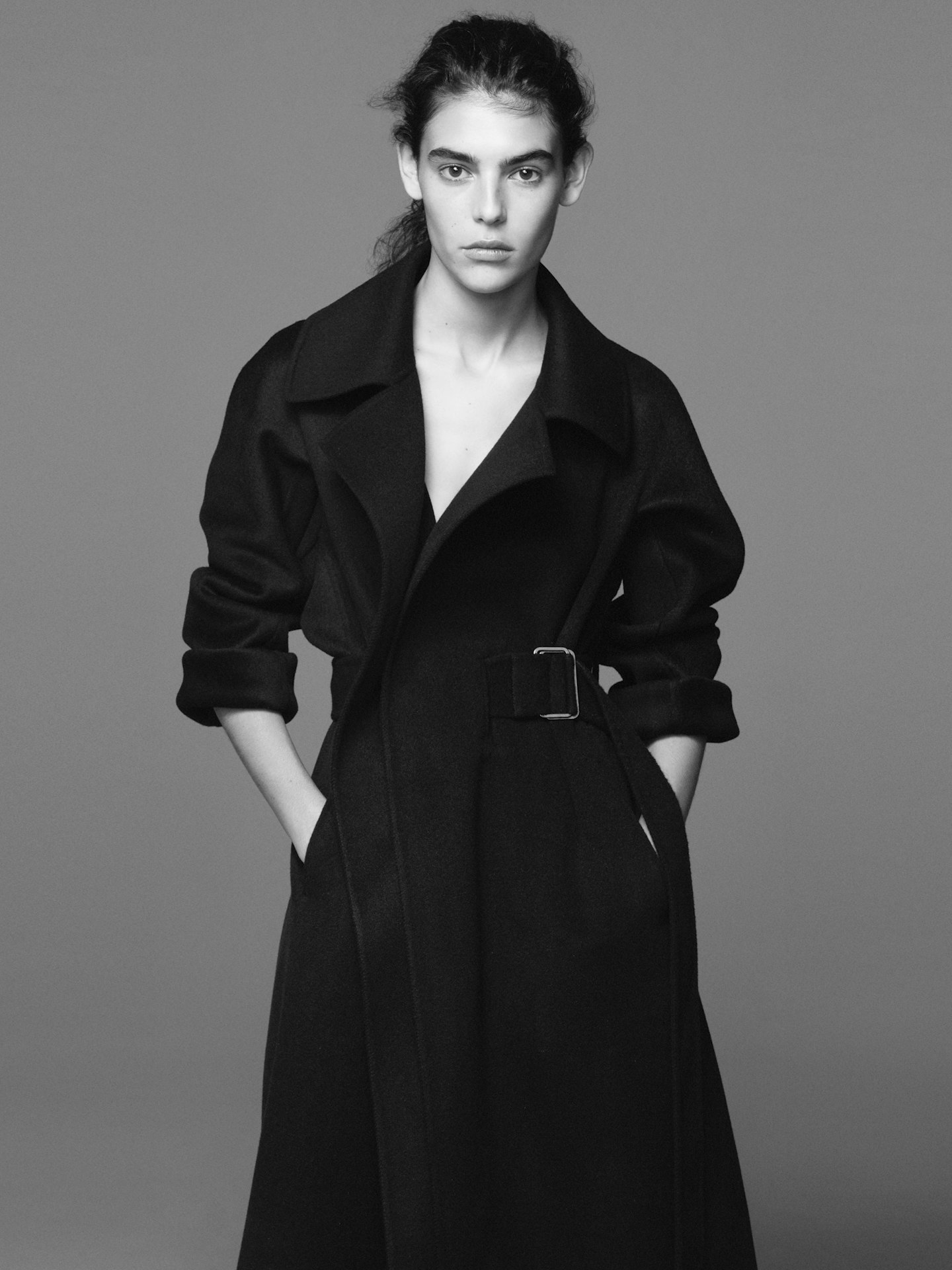 A model wearing a wool-blend coat from J+