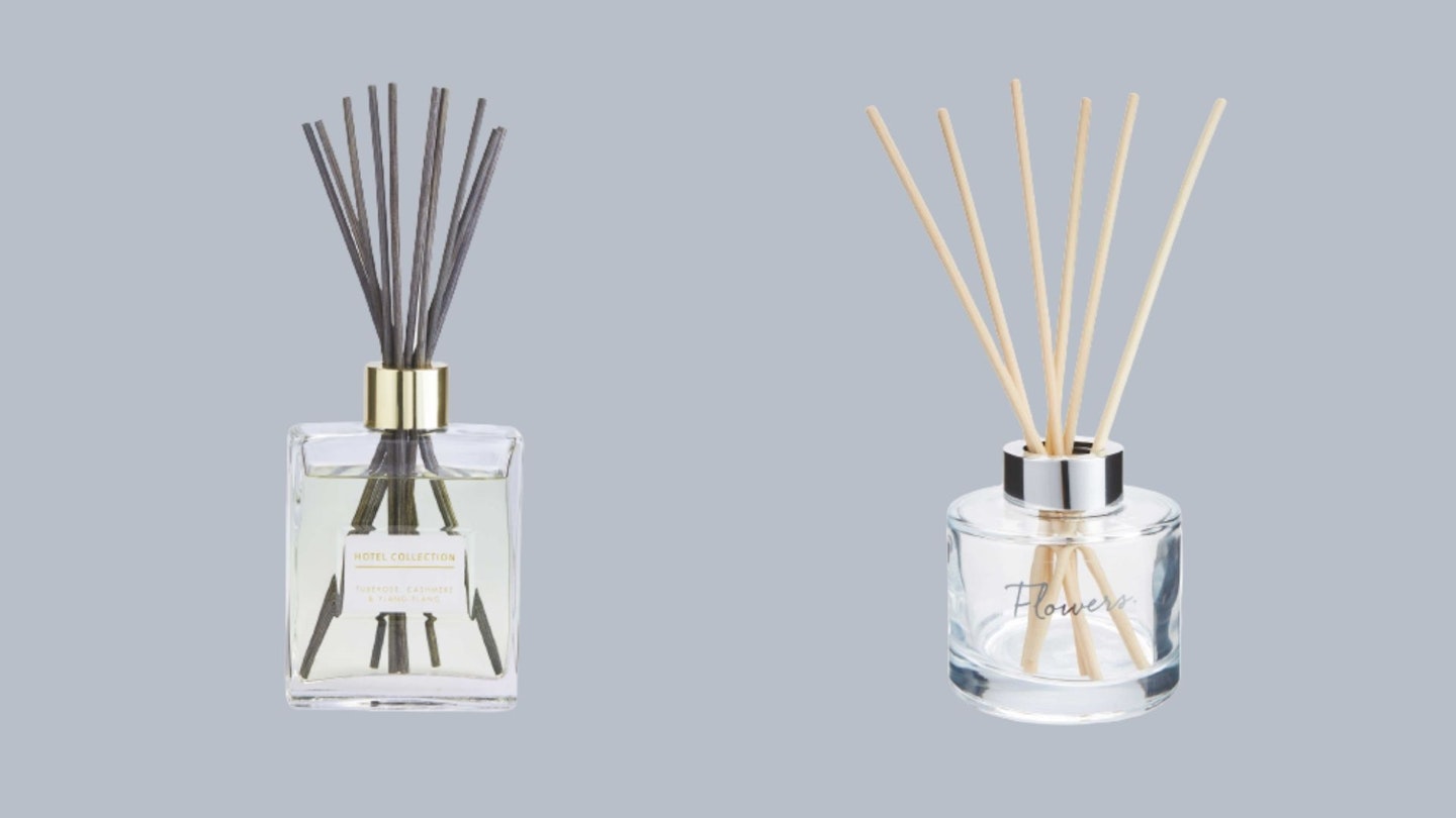 Aldi's Hotel Collection: XL Grey Diffuser and Flowers Reed Diffuser on a pale blue background.