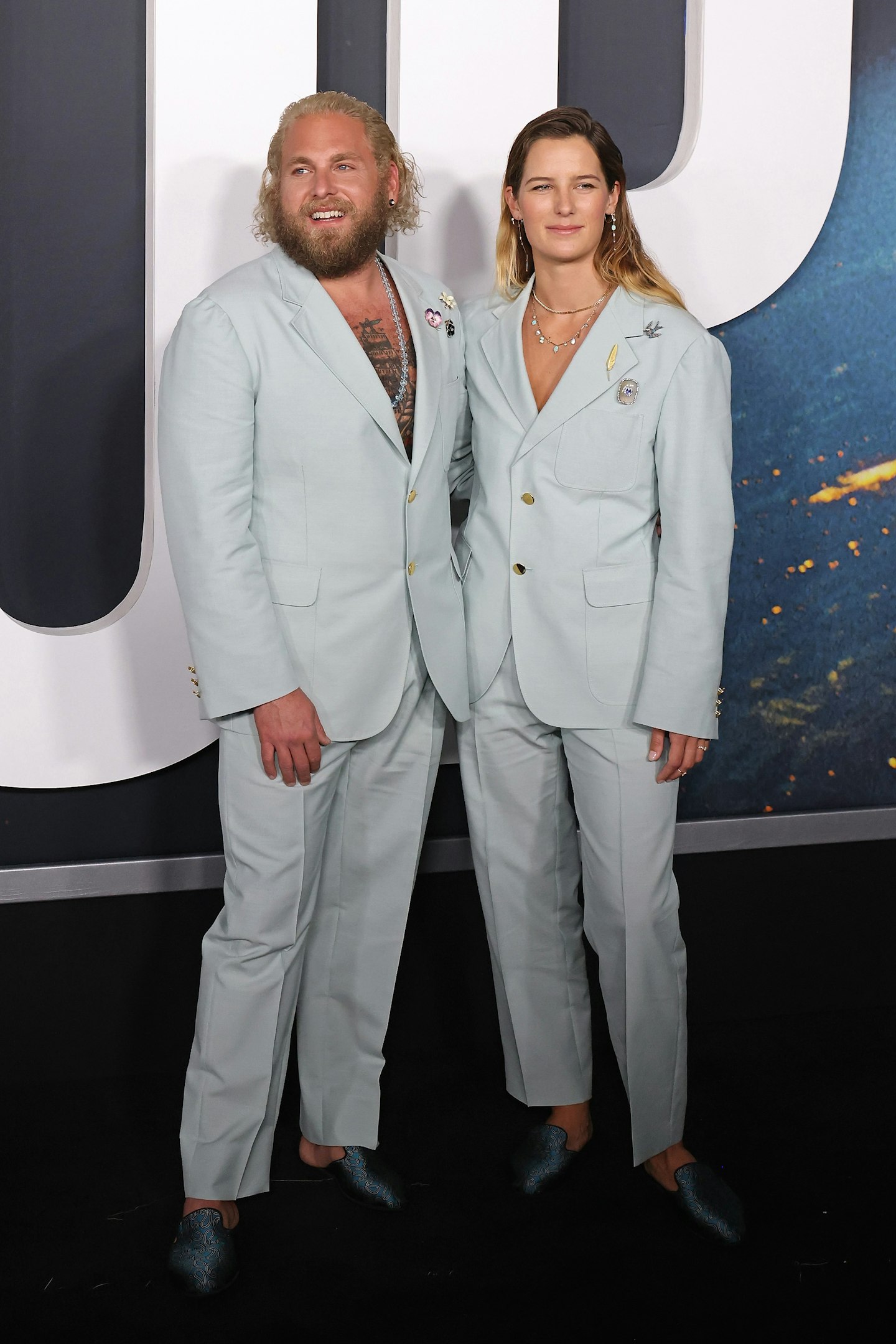 jonah hill and sarah brady in blue suits