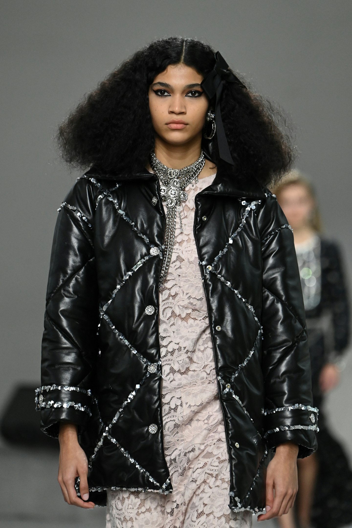 A model on the catwalk at Chanel's Métiers d’art