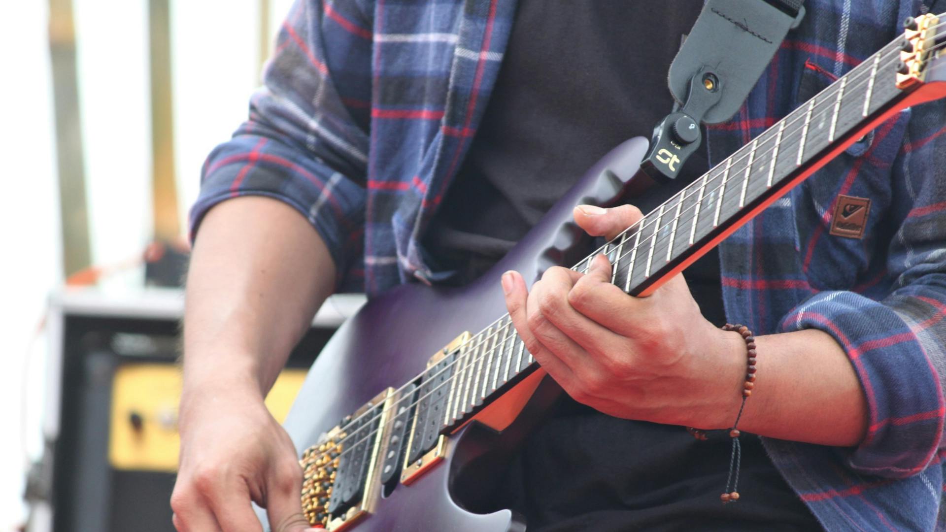 An image of a guitarist