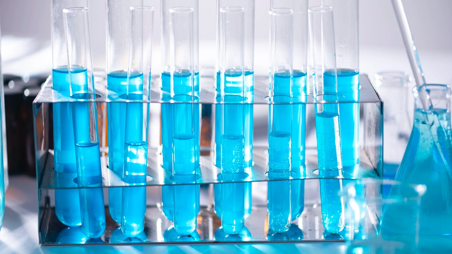 PCR Test tubes with blue liquid in a lab
