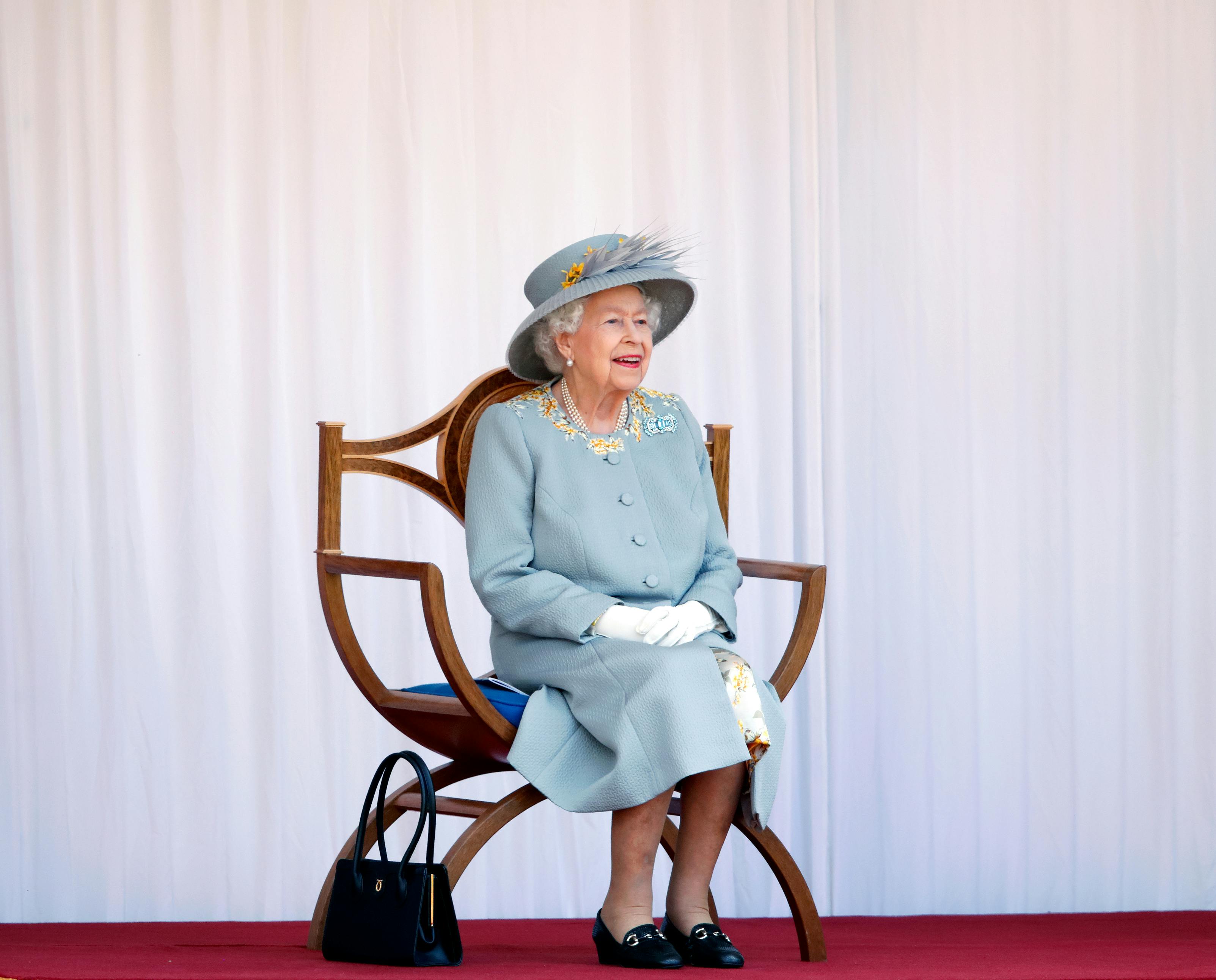 Why Does The Queen Always Carry A Handbag