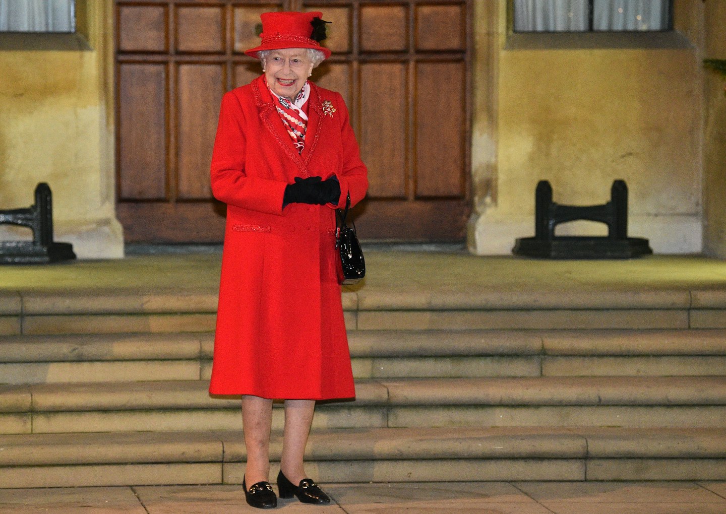 Why Does The Queen Always Carry A Handbag?