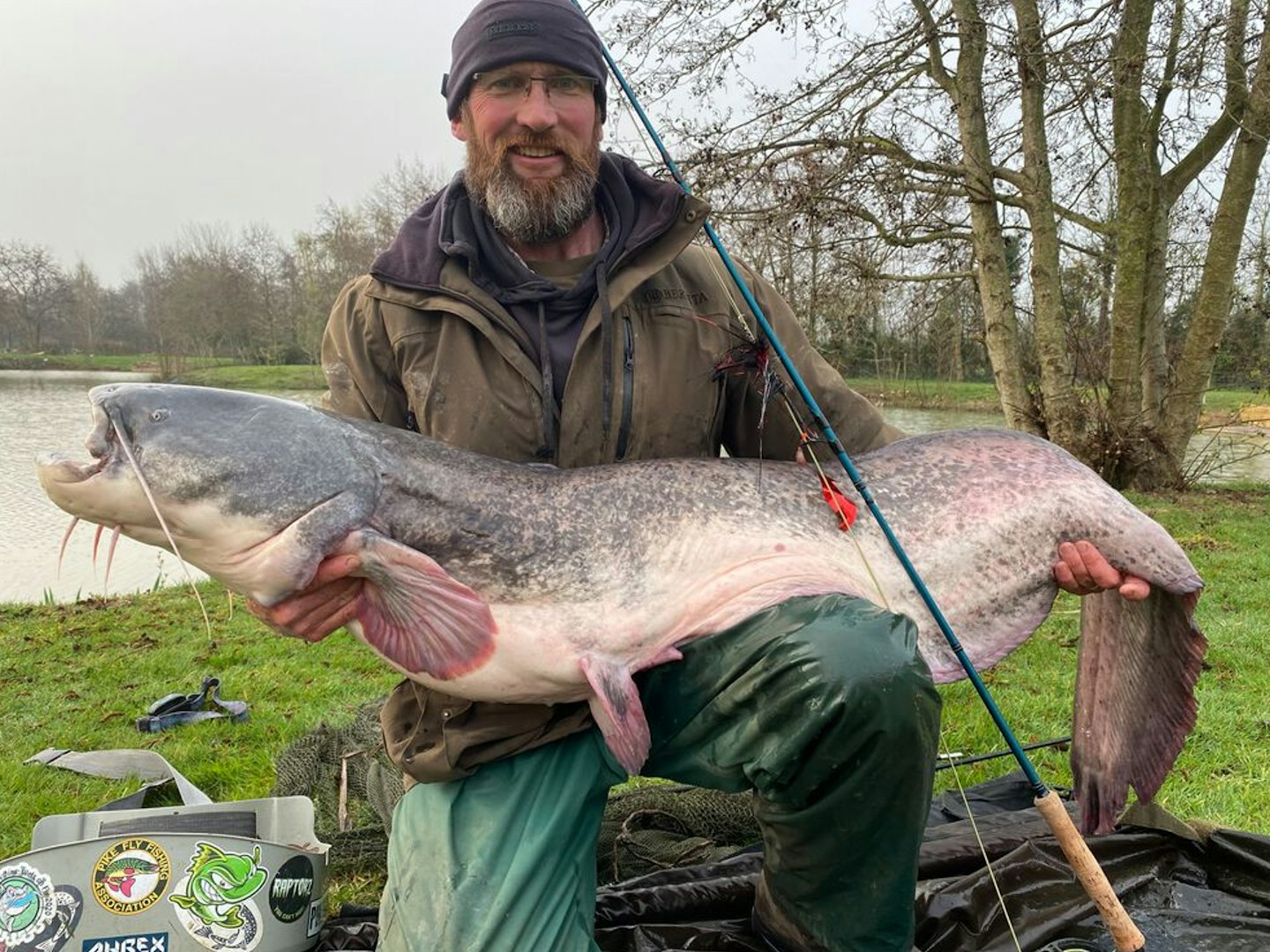 Oliver Cullingford landing the UK’s biggest-ever fly-caught catfish weighing 66lb 8oz
