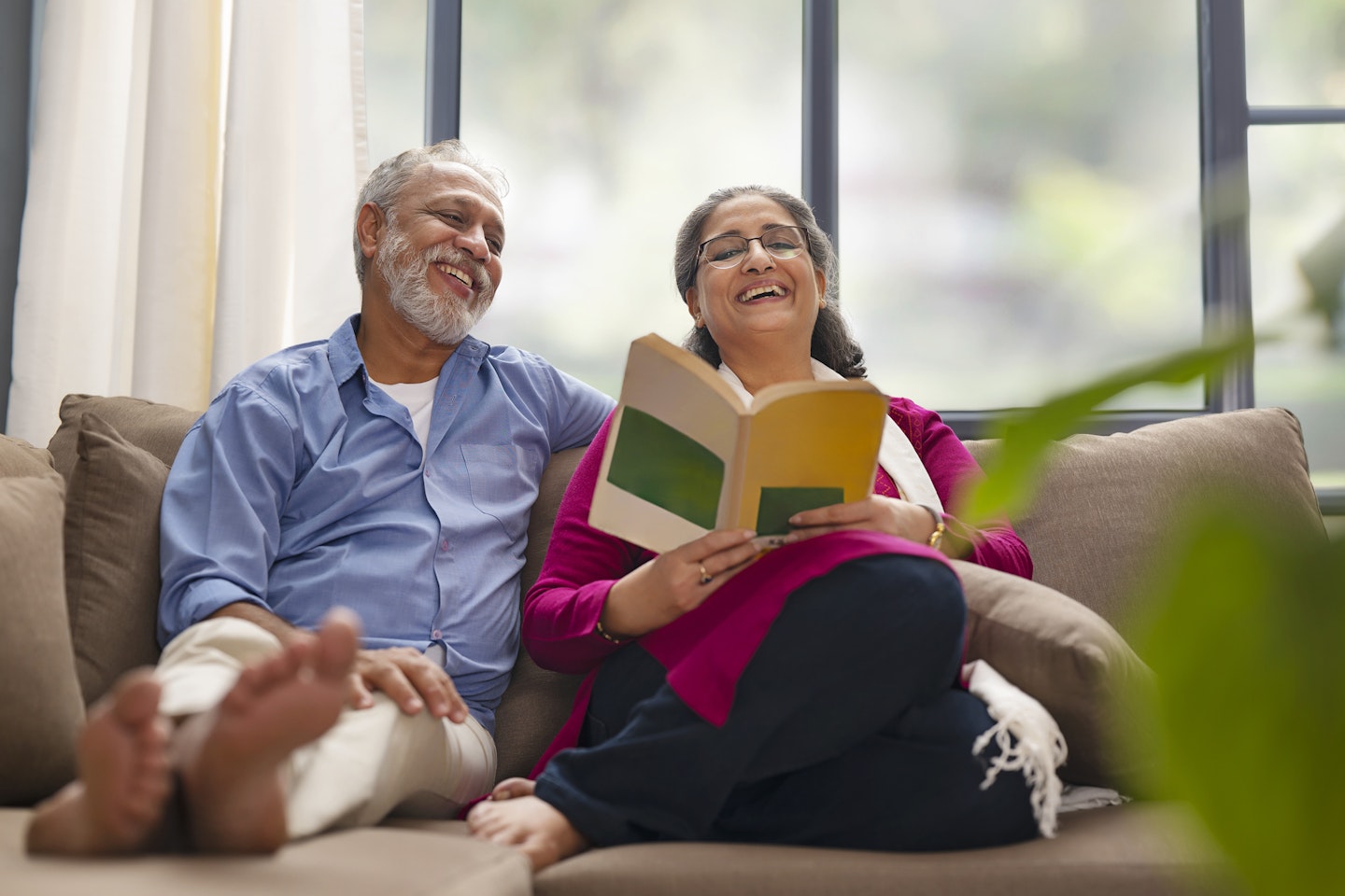 couple reading book together