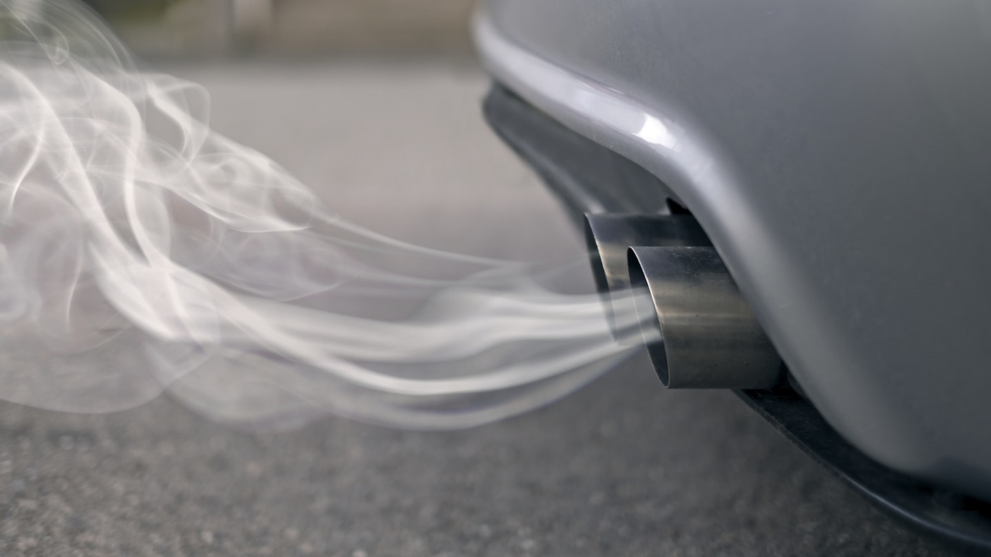 Smoky Exhaust Pipes From A Starting Diesel Car
