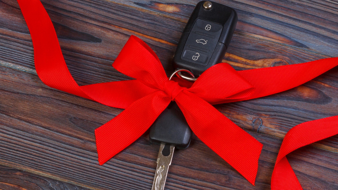 Car keys with a red bow