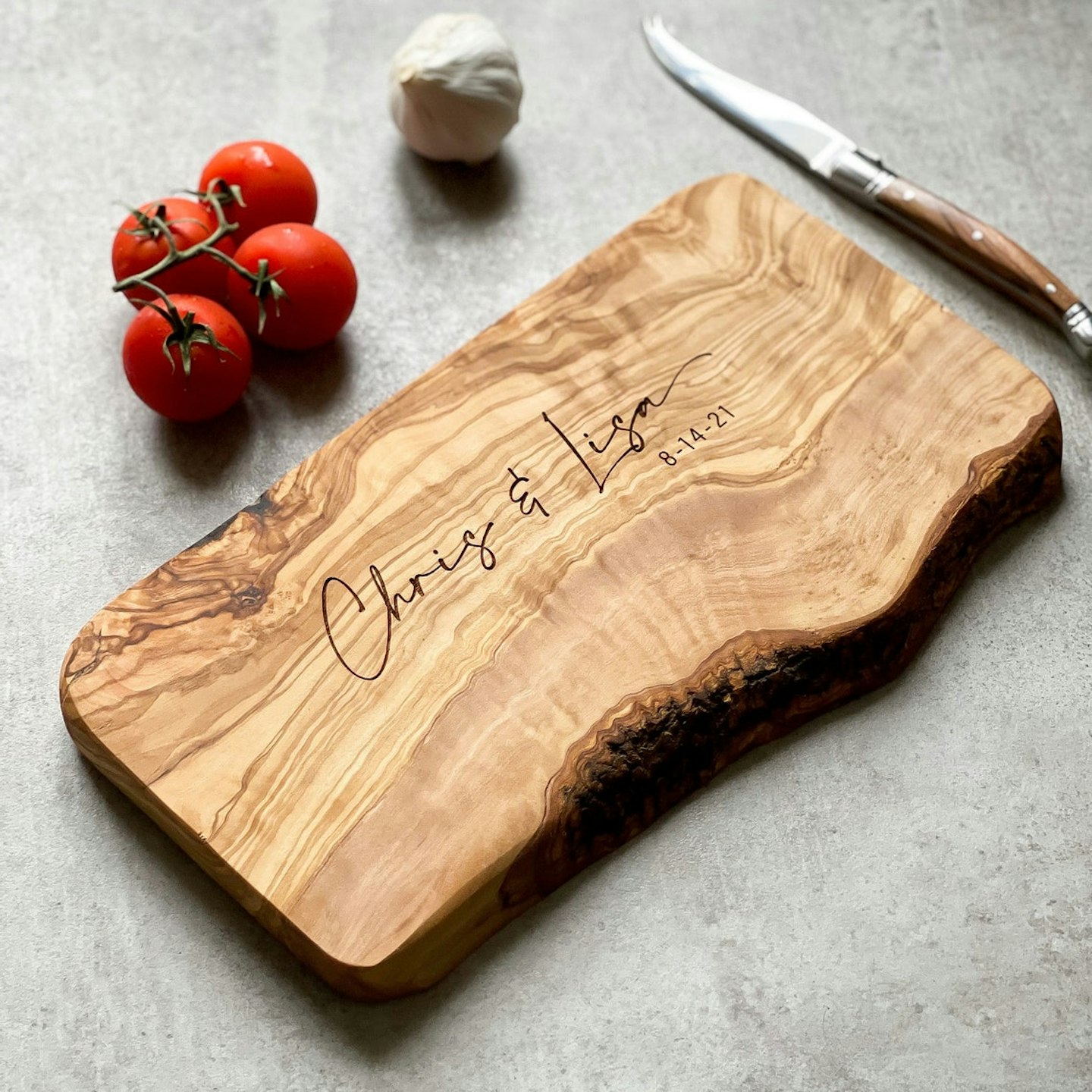 Etsy, Personalized Rustic Olive Wood Cutting Board, From £25.99