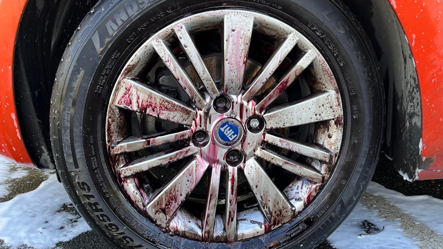 A wheel with iron fallout remover applied to it