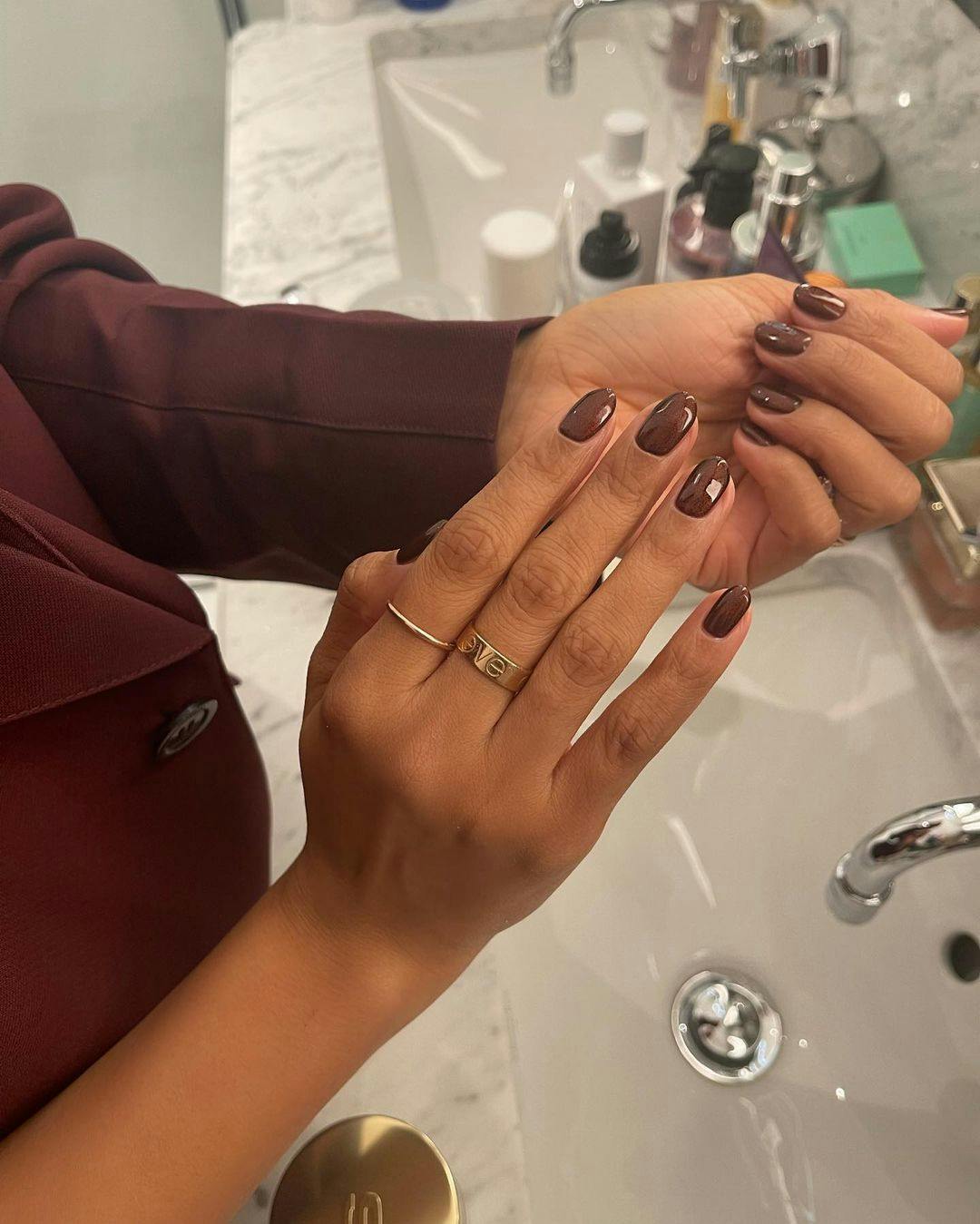 Nail Colors That Look Flattering on Dark Skin Tones - MorningKo | Dark skin  nail polish, Cute nail colors, Gel manicure nails
