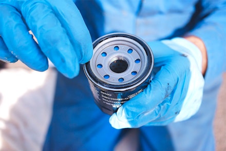 Applying a thin film of fresh oil to the new filter seal