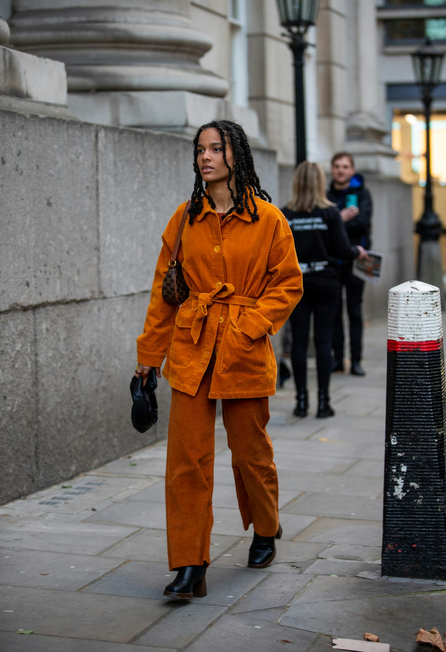 This street-styler's tangerine co-ord was a cheerful moment outside Rixo