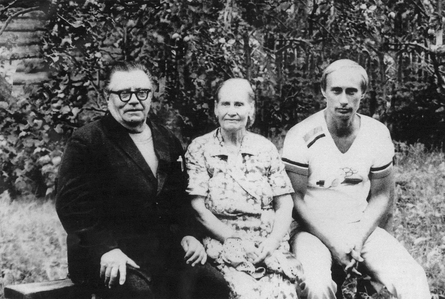 Vladimir Putin with his parents Maria and Vladimir Putin in 1985.