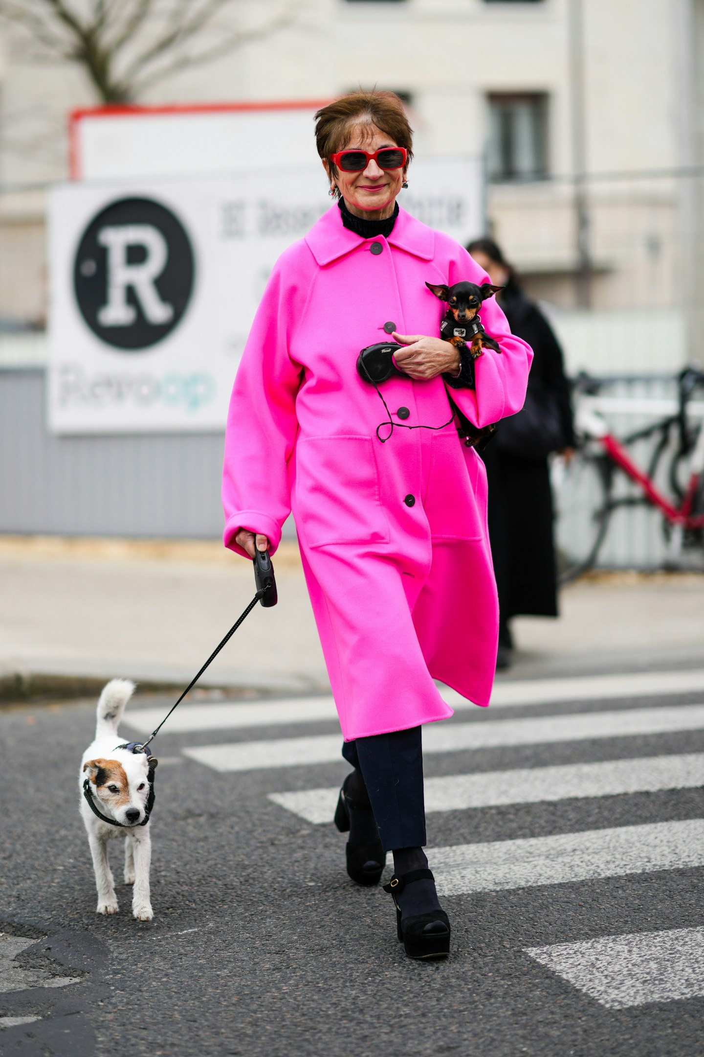 A street-styler wearing pink at Paris Fashion Week