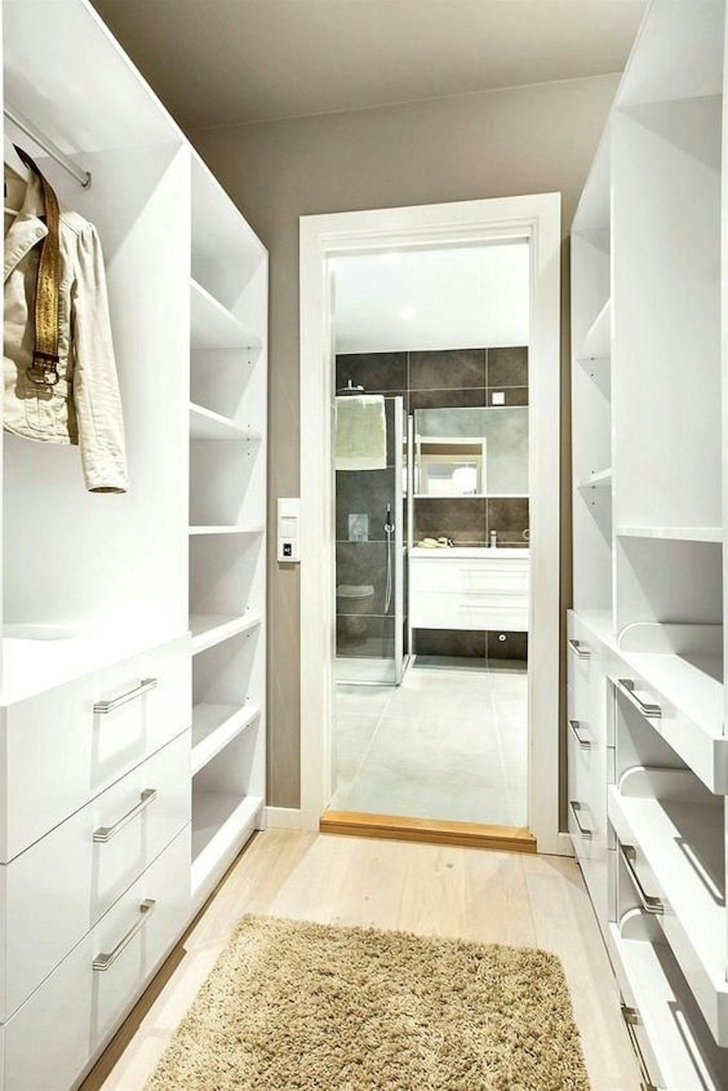 Walk in wardrobe with bathroom