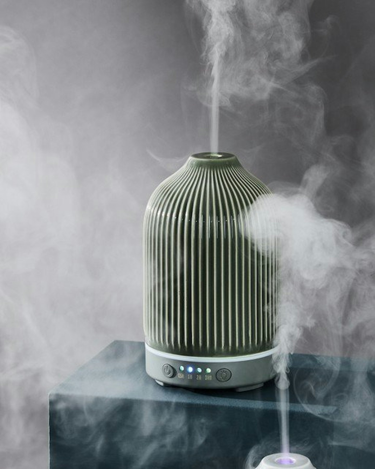 Oliver Bonas, Sage Green Essential Oil Electric Aroma Diffuser, £45