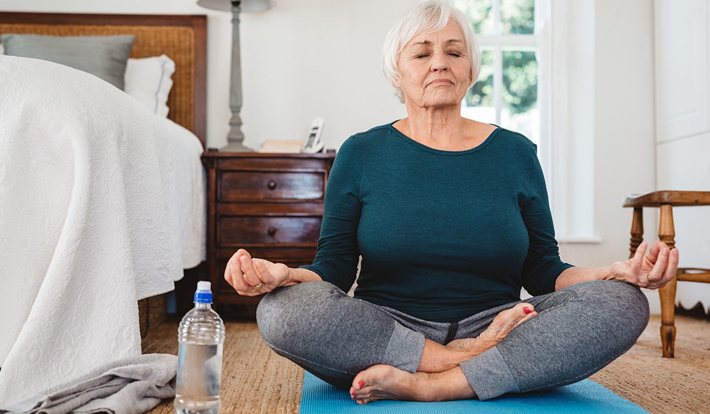 mature woman doing yoga