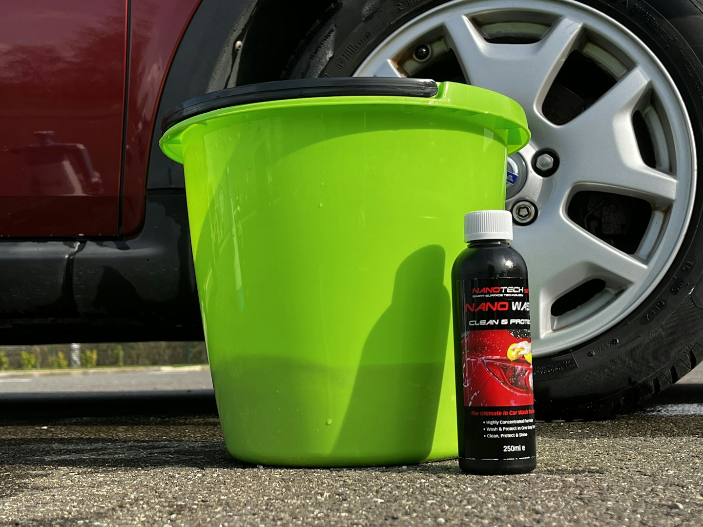 Nano Wash next to a green bucket