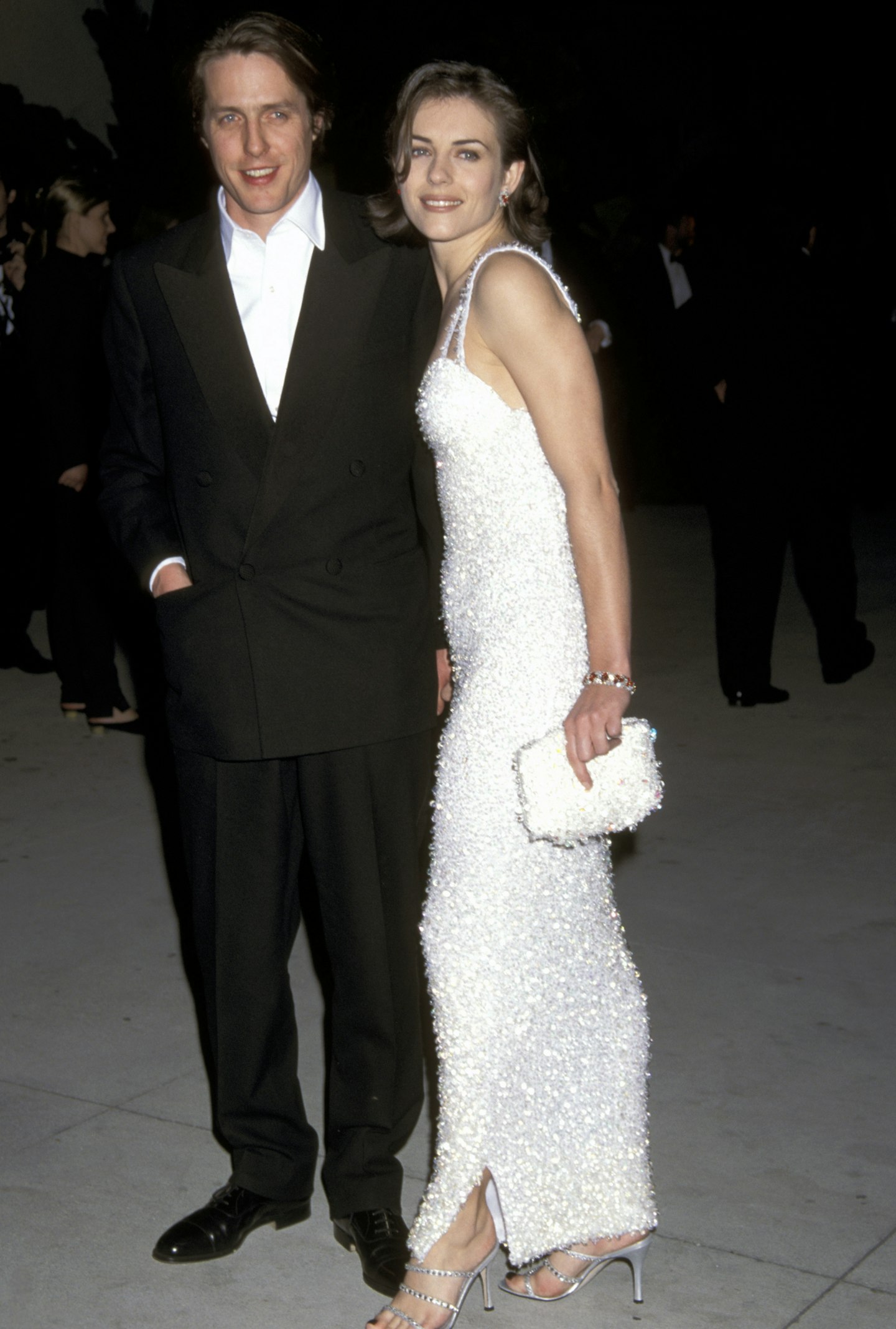 90s Oscars Fashion Hugh Grant and Elizabeth Hurley