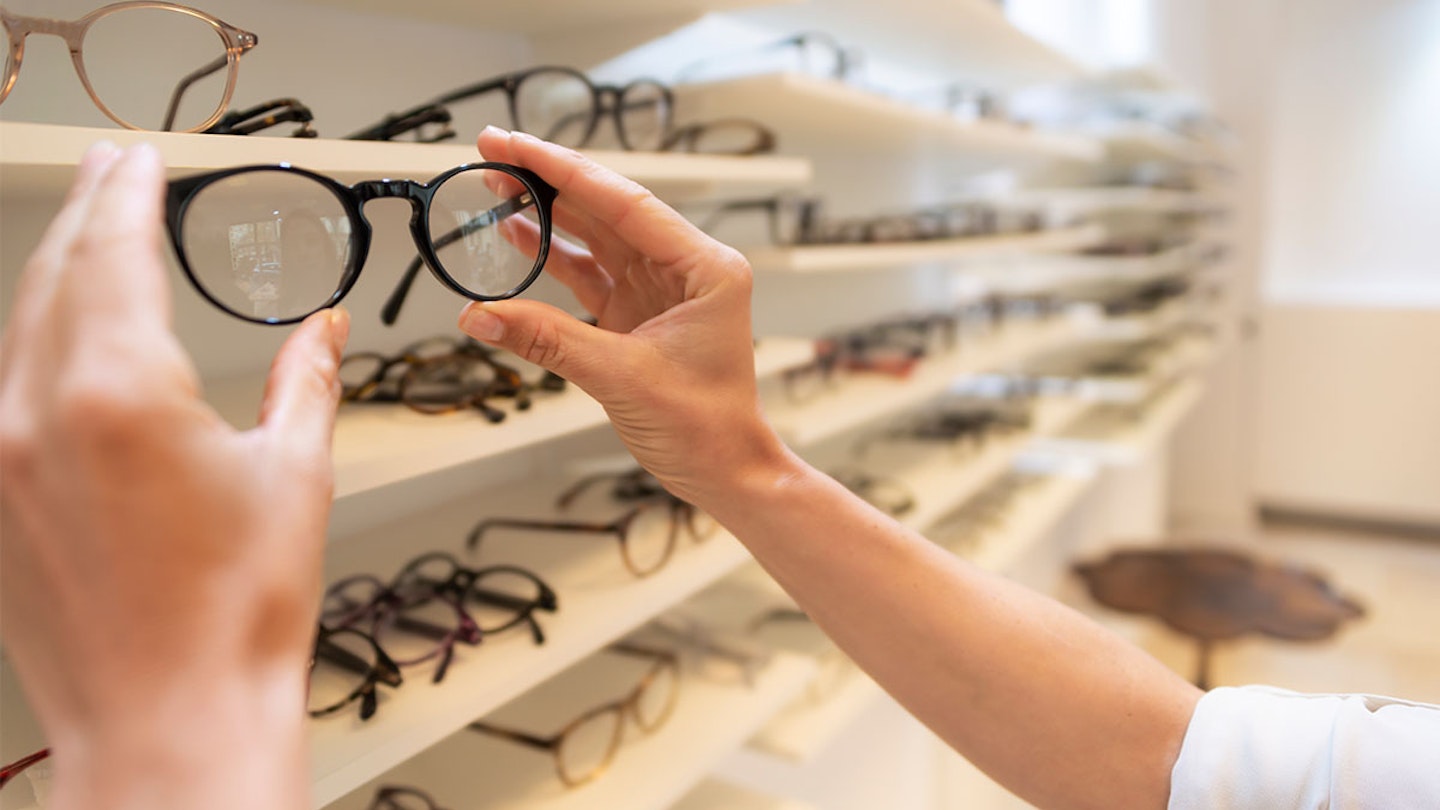 woman shopping for glasses