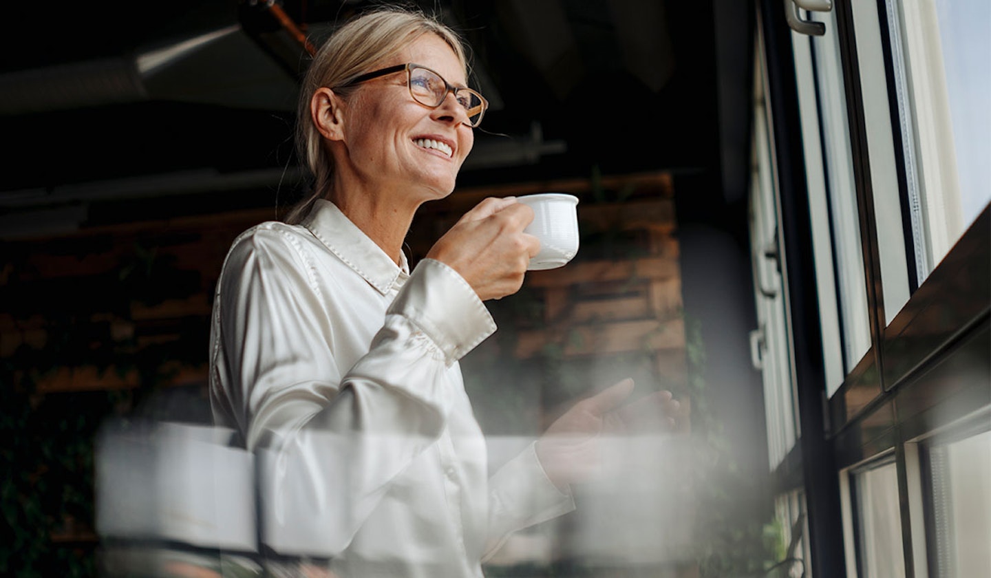 woman in glasses smiling