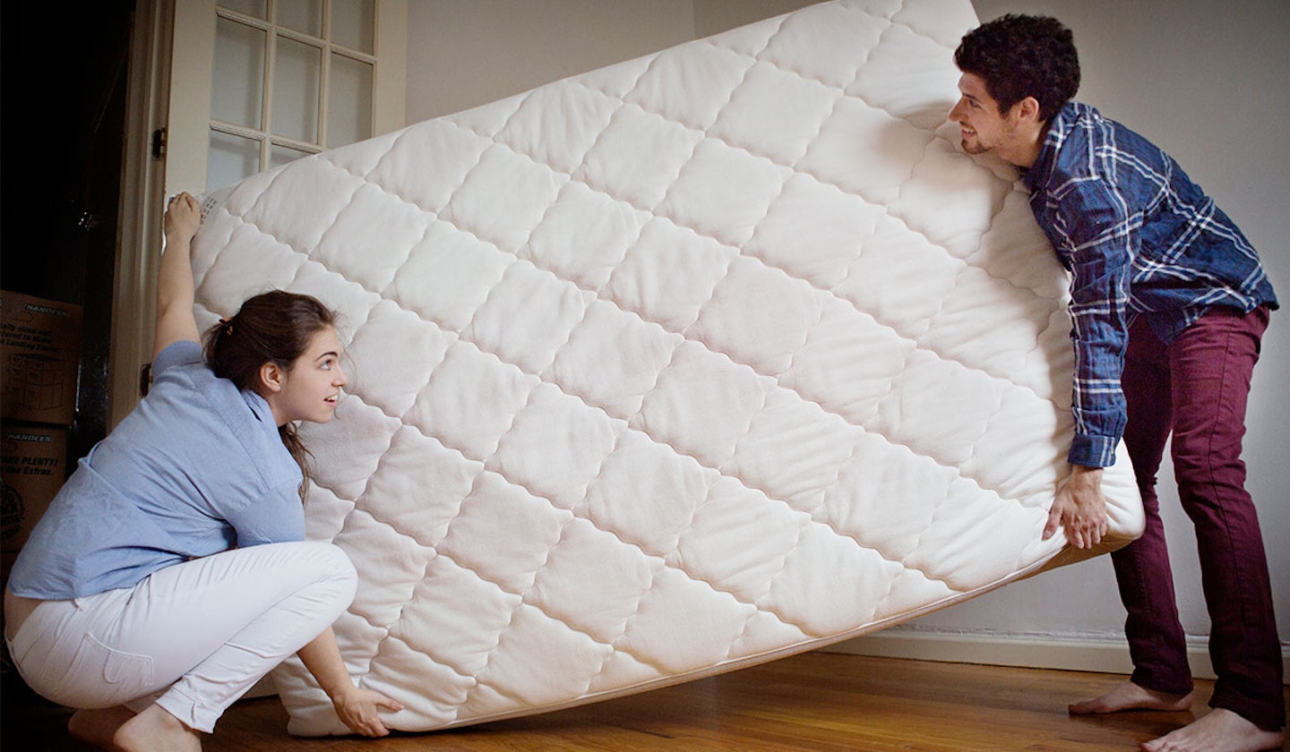 Couple moving mattress