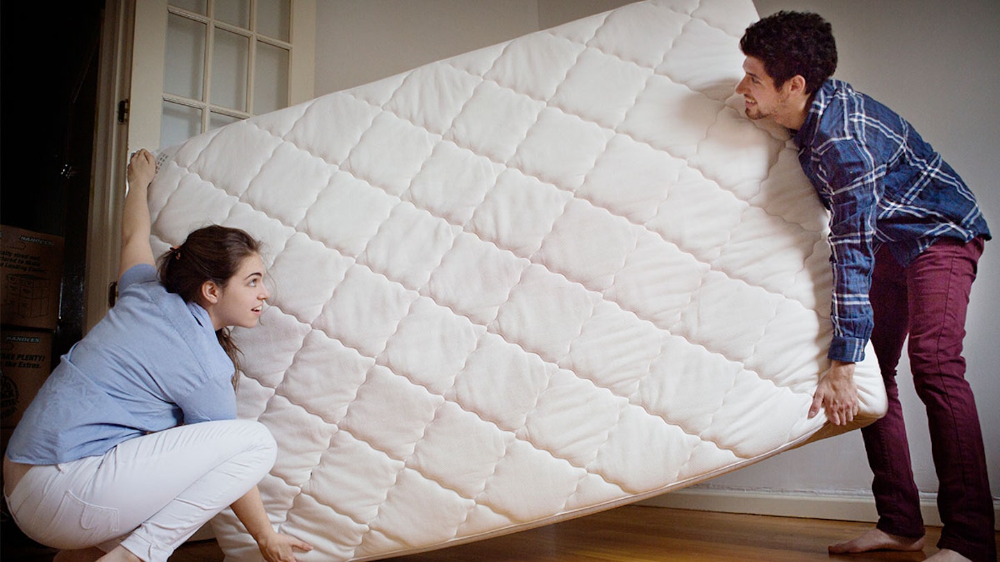 Couple moving mattress