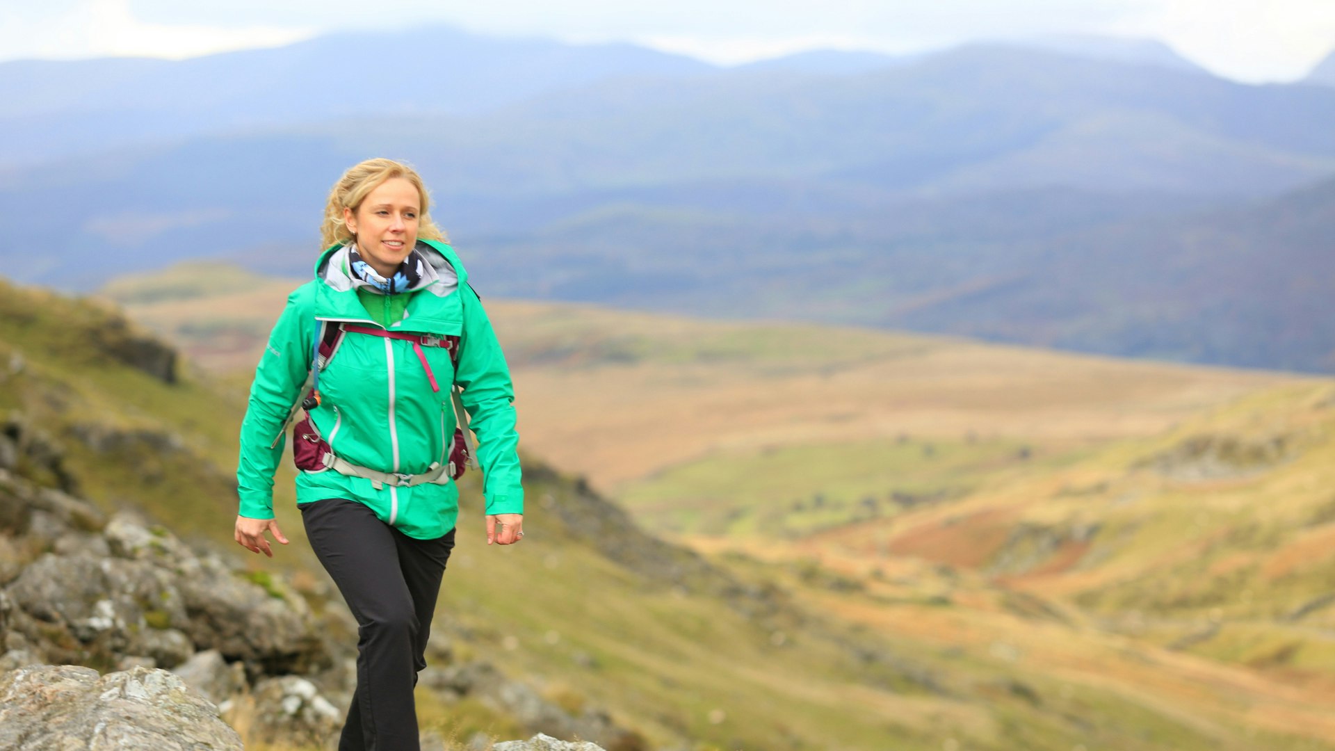 Woman wearing green jacket in East Snowdonia
