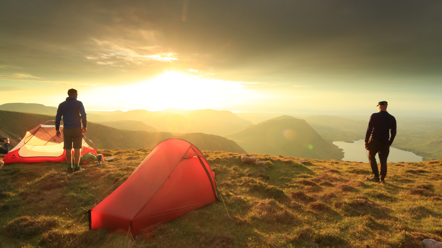 Summit campsite in Lake District at sunset