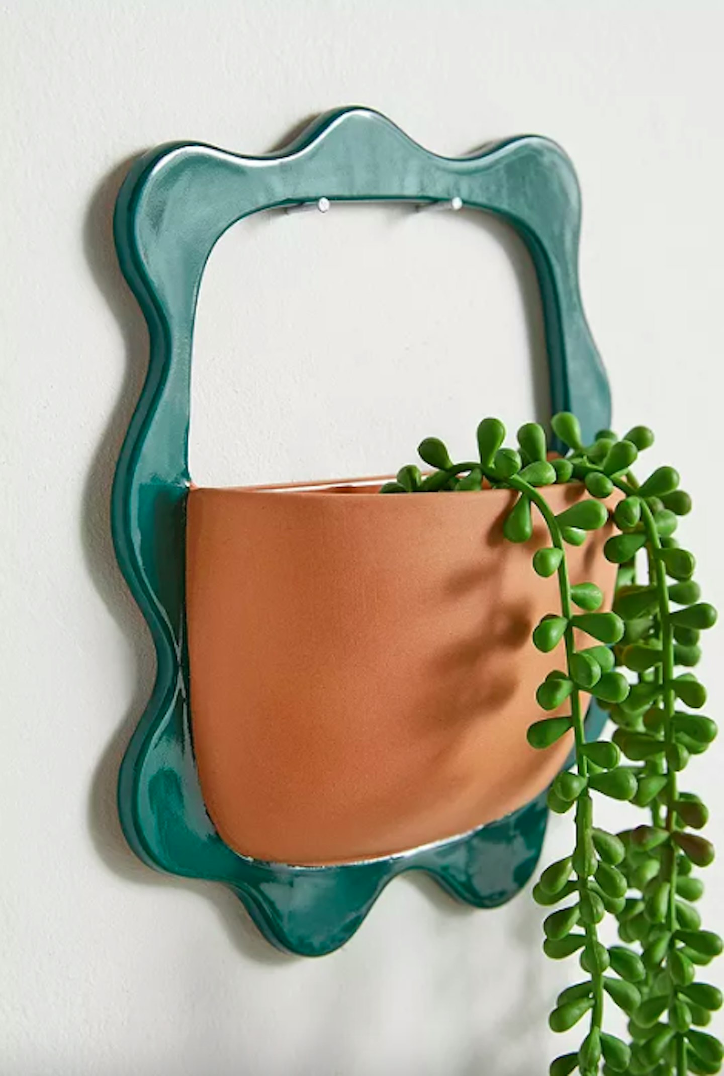 Urban Outfitters, Ximena Wall Mounted Vase, £25