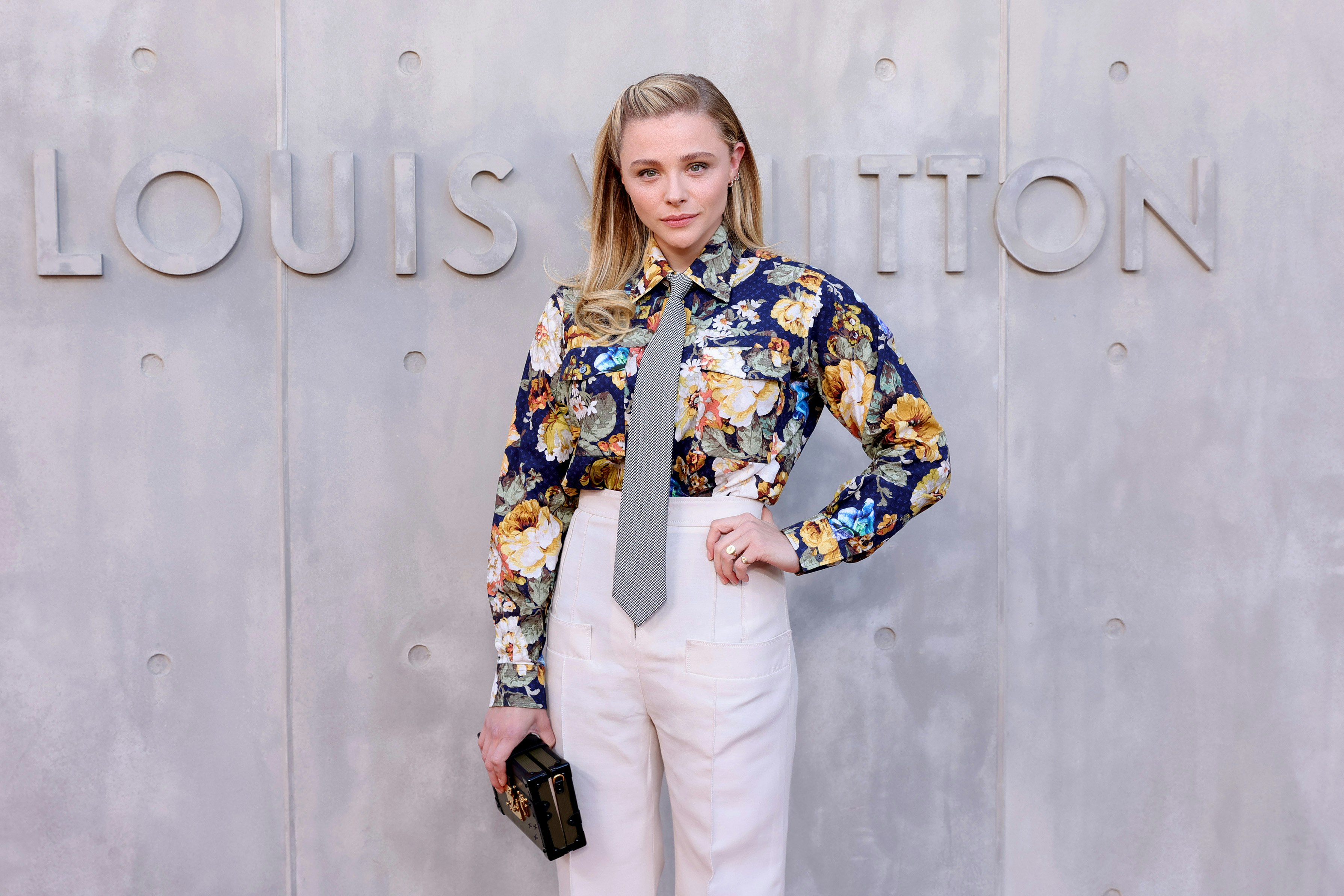 Street style, Chloe Grace Moretz arriving at Louis Vuitton Fall