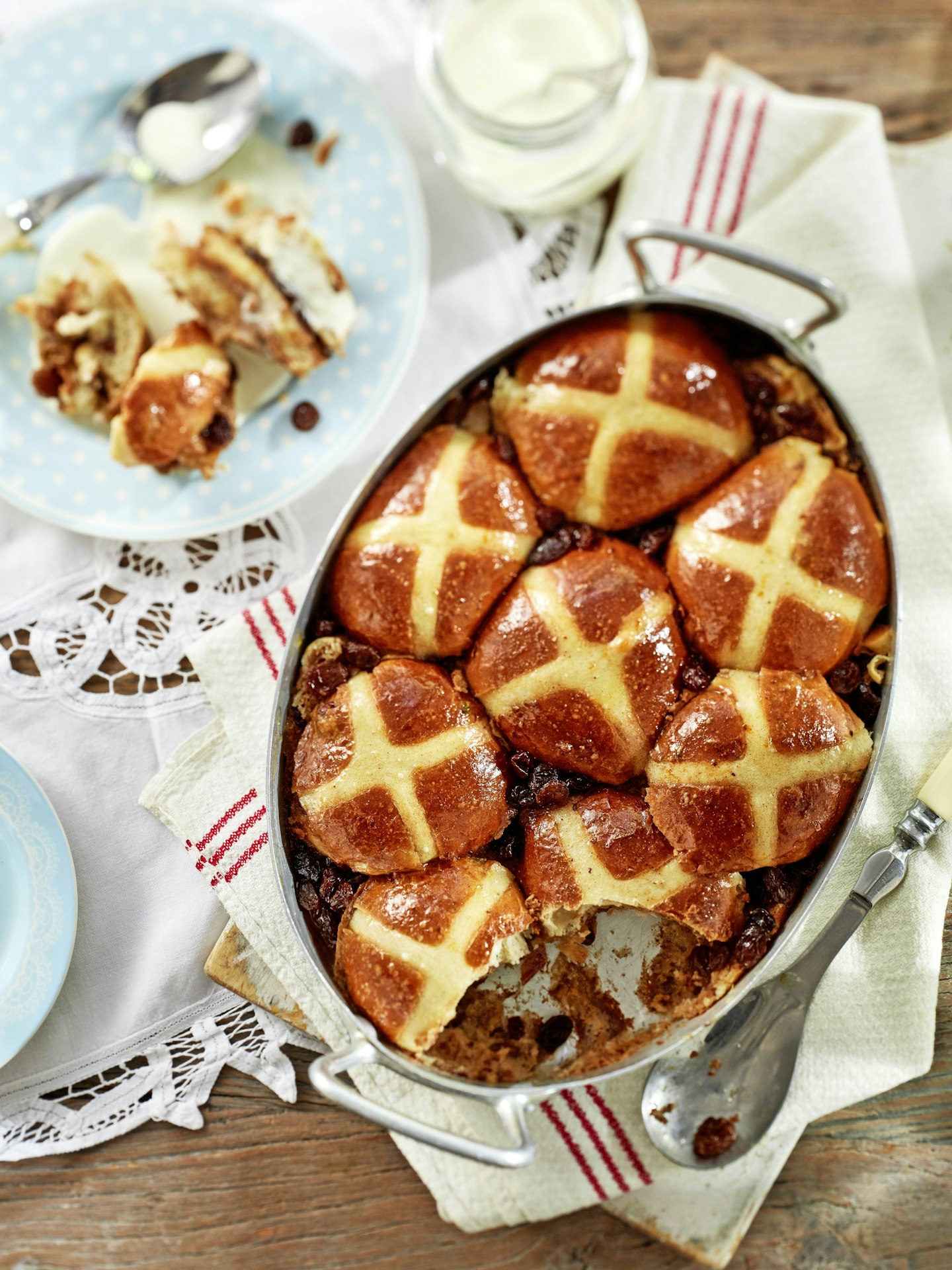 Hot Cross Bun Bread and Butter Pudding on a spring table