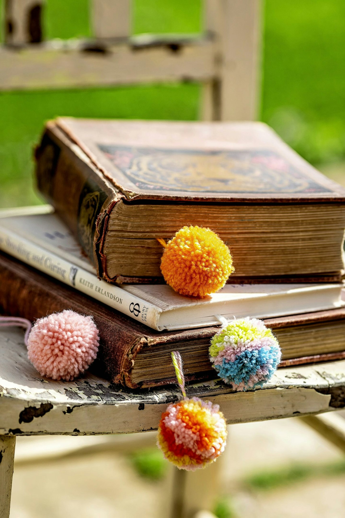 Colourful pompom bookmarks